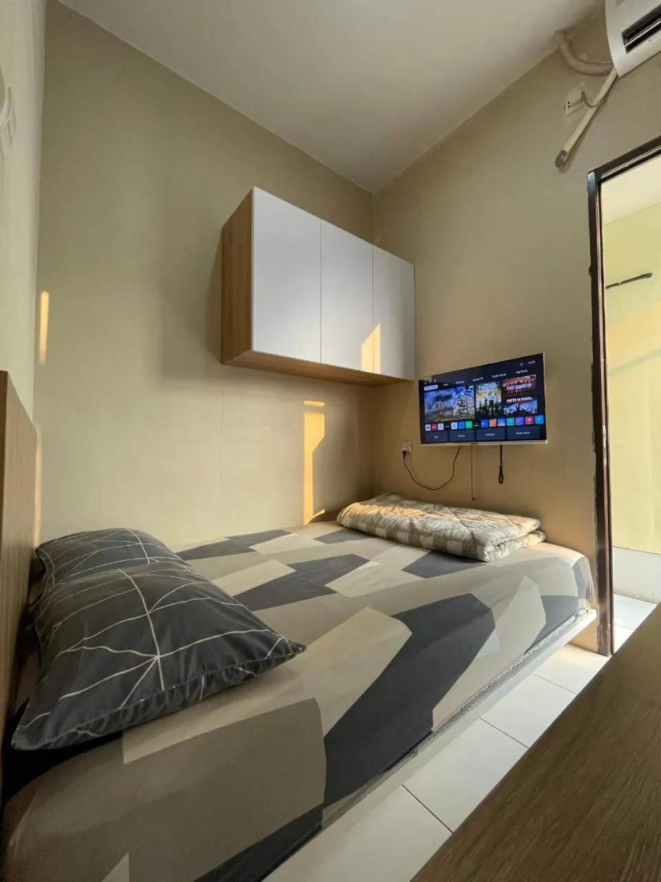 Bed in Behomy Cibinong Suite