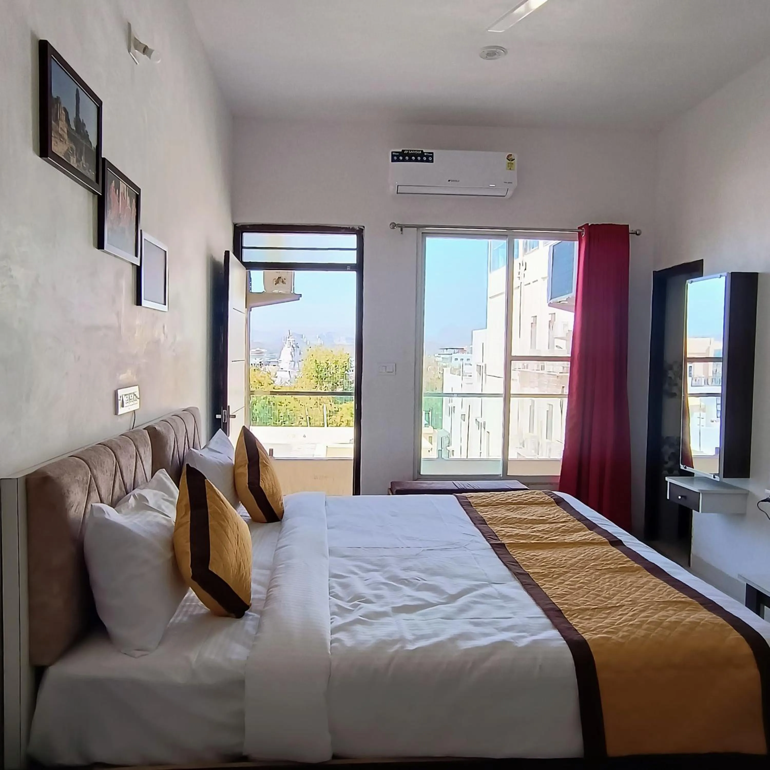 Bed in Arul's Hotel