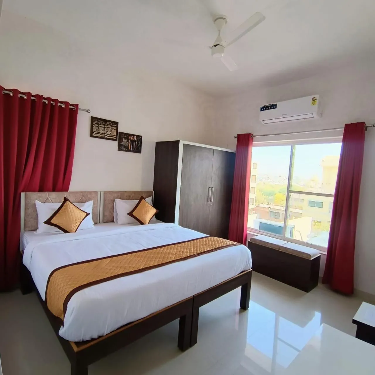 Bed in Arul's Hotel