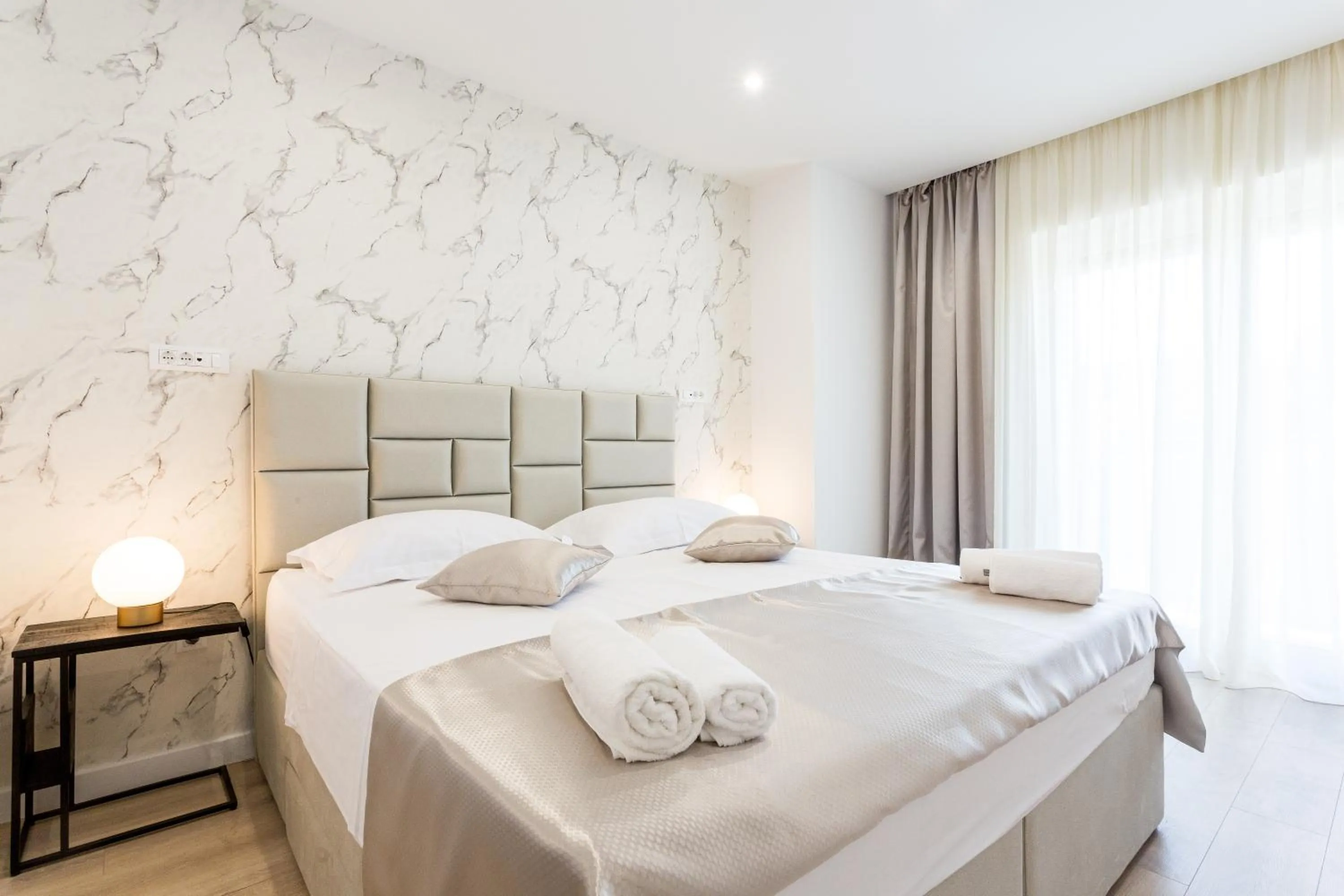 Bed in Shine of Life Luxury Rooms