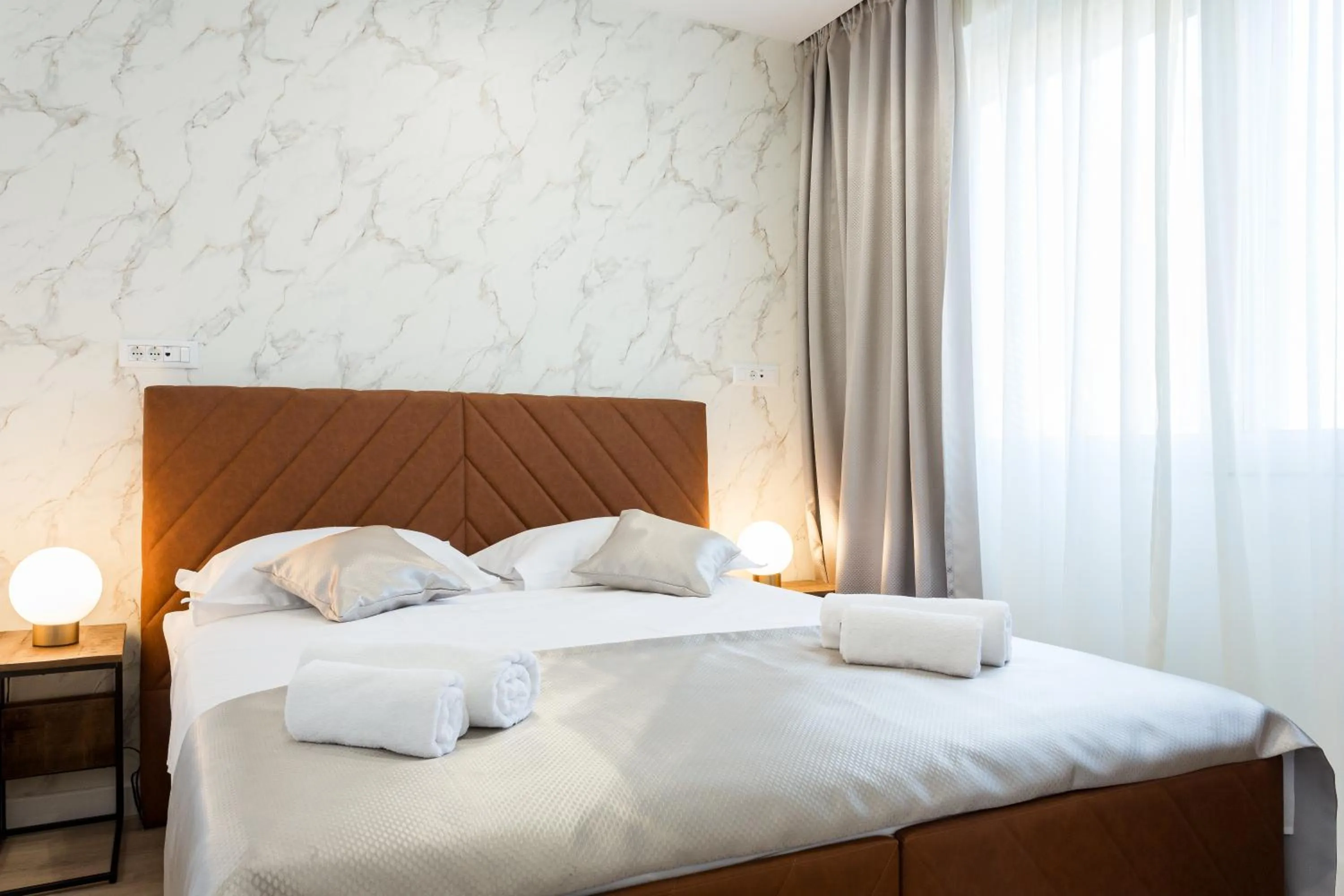 Bed in Shine of Life Luxury Rooms