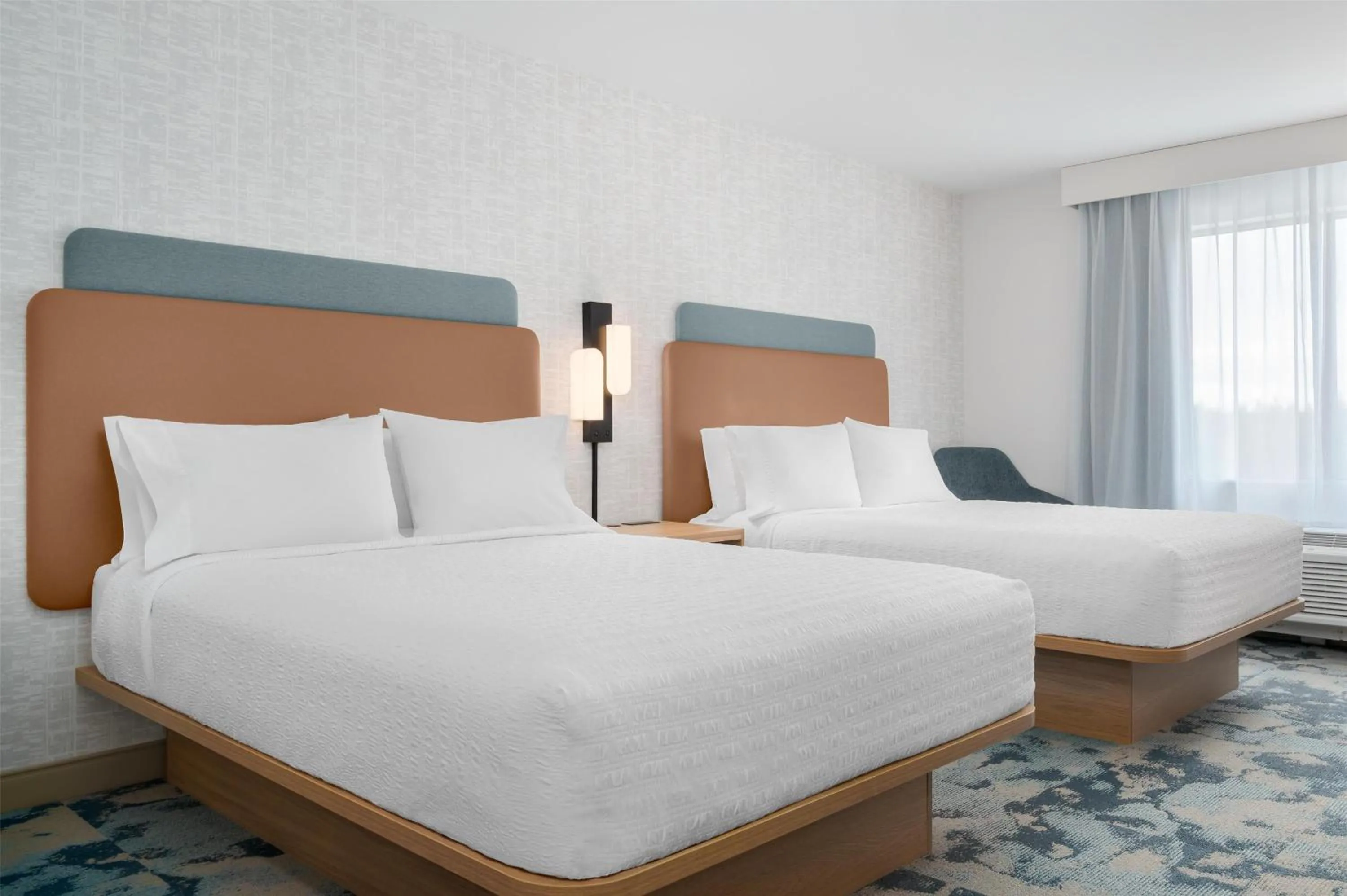 Bed in Hampton Inn & Suites Alpena