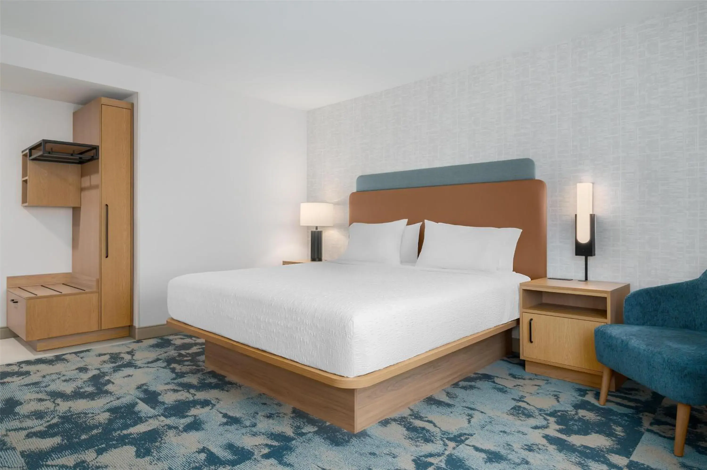 Bed in Hampton Inn & Suites Alpena Bed in Hampton Inn & Suites Alpena