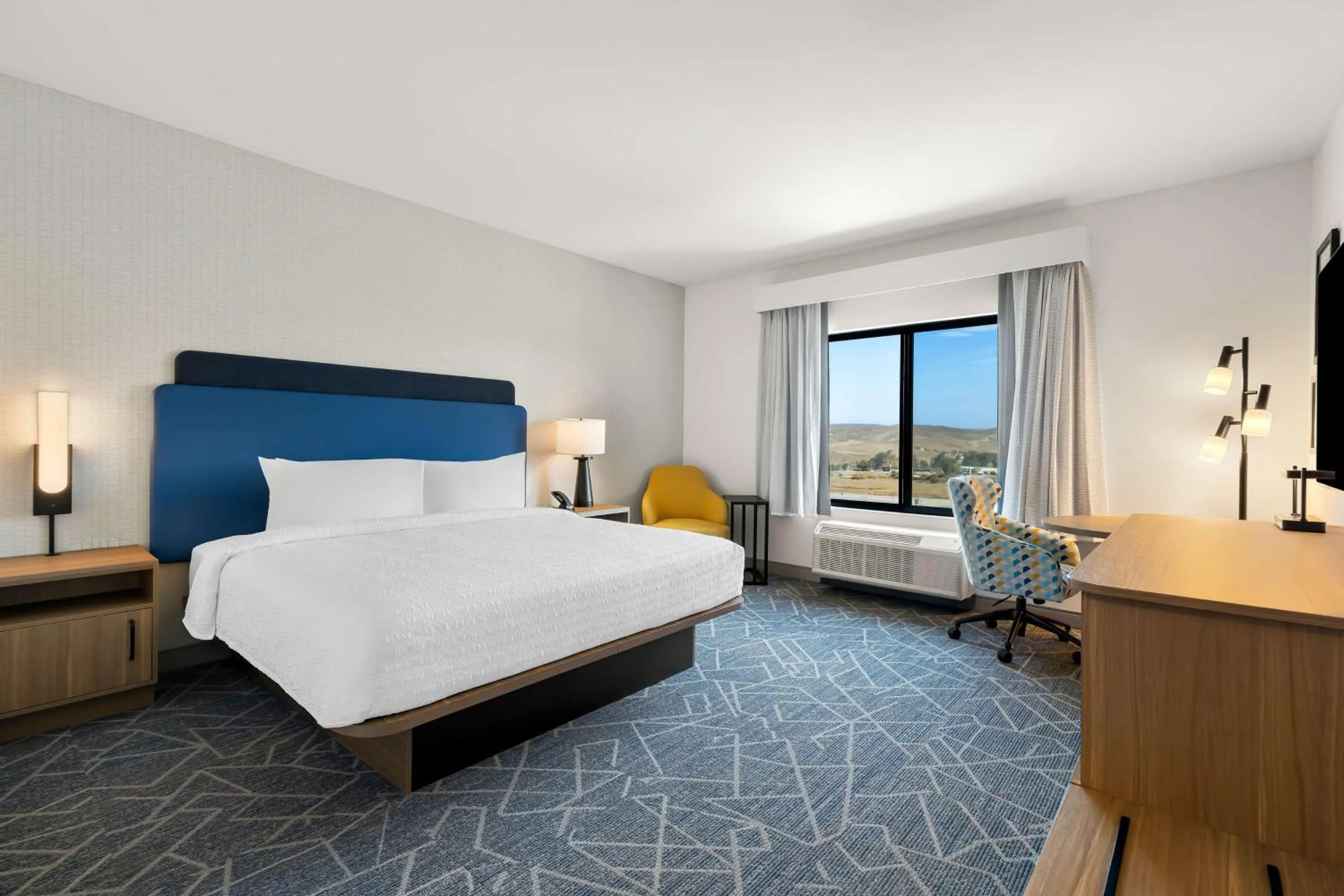 Bed in Hampton Inn & Suites Corona, Ca