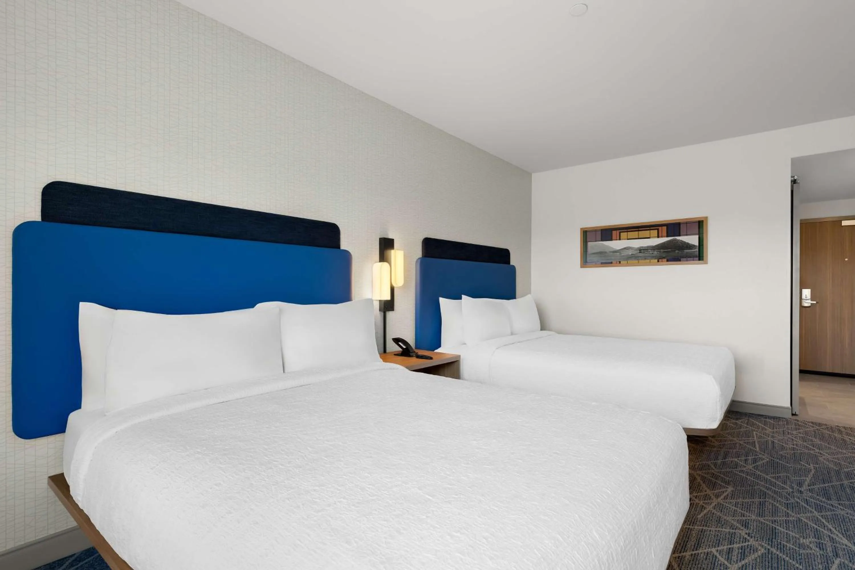 Bed in Hampton Inn & Suites Corona, Ca