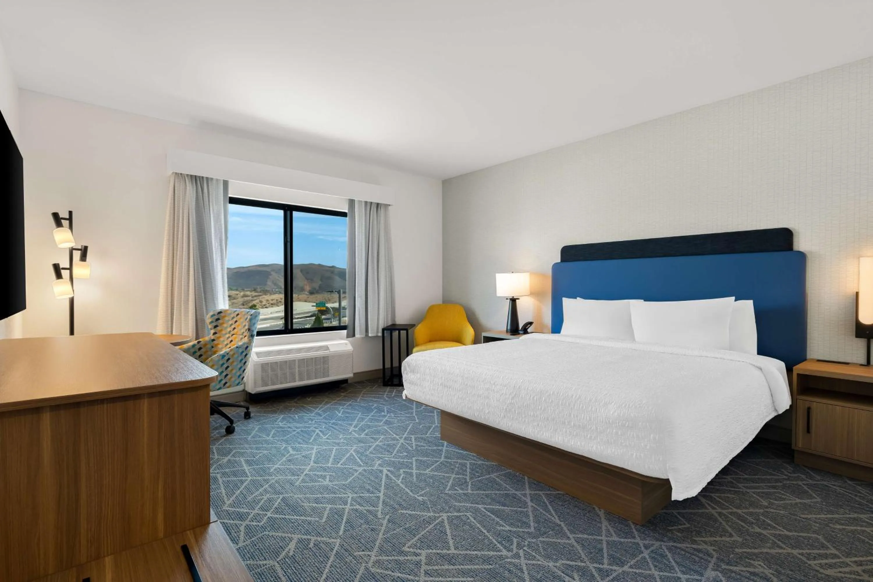 Bed in Hampton Inn & Suites Corona, Ca