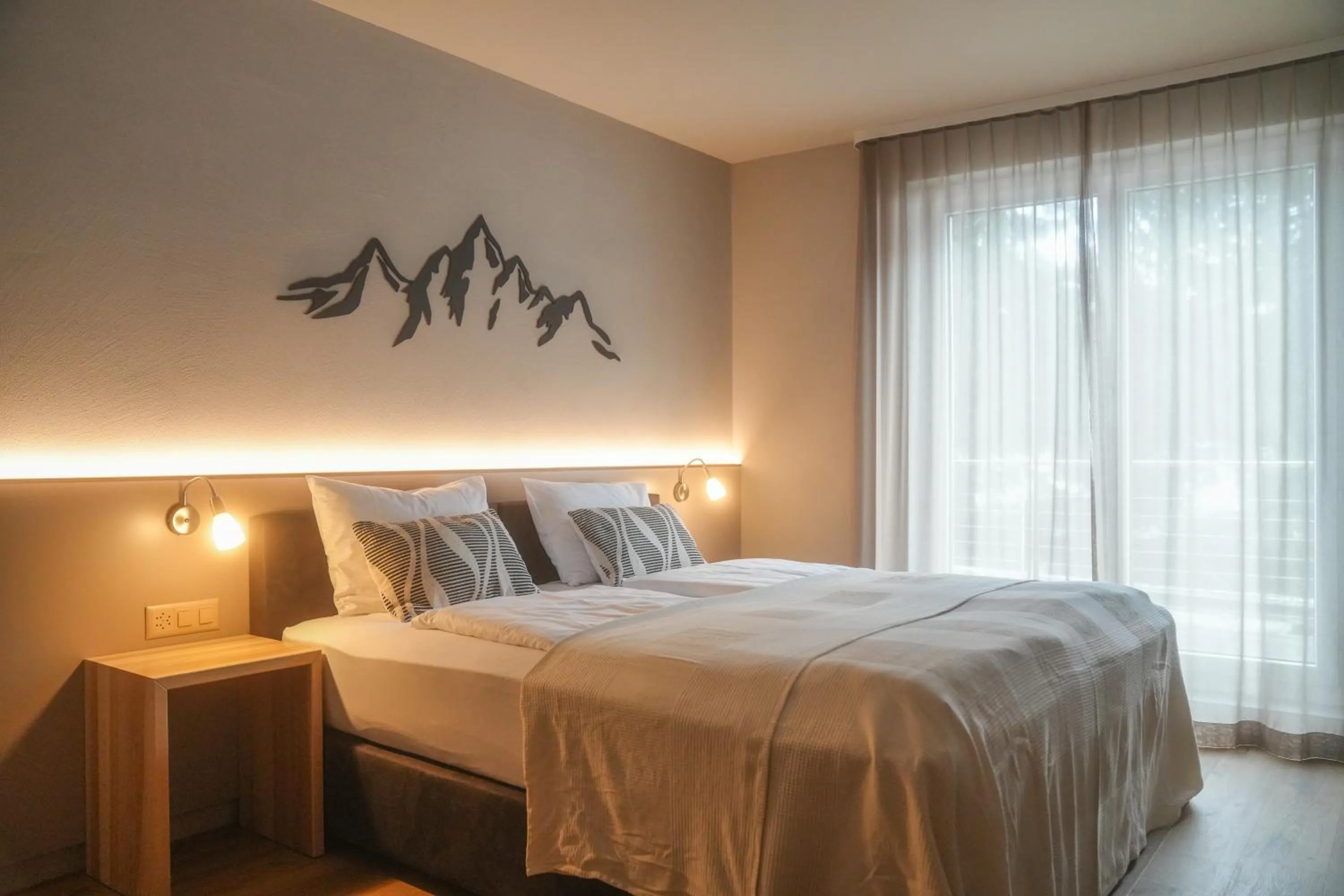 Photo of the whole room, Bed in Studio 54 Davos