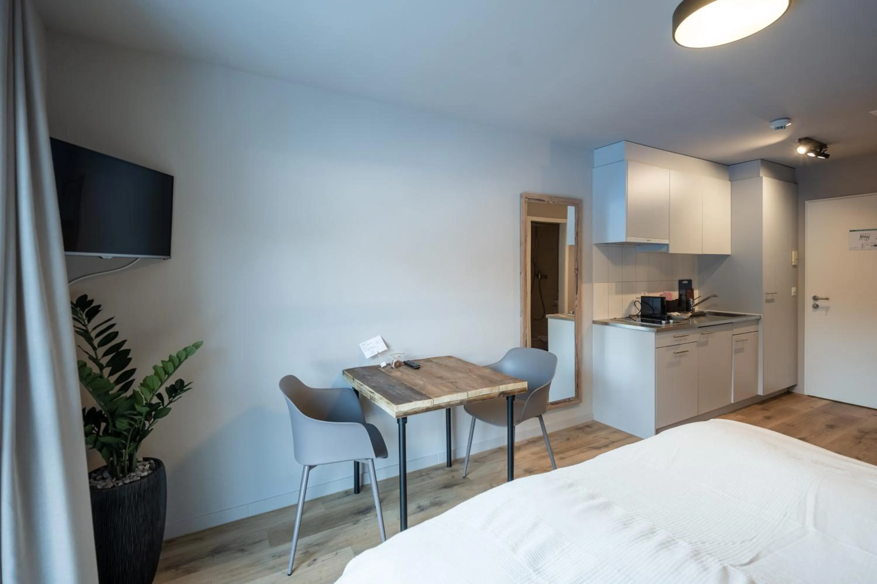 Dining area, Bed in Studio 54 Davos