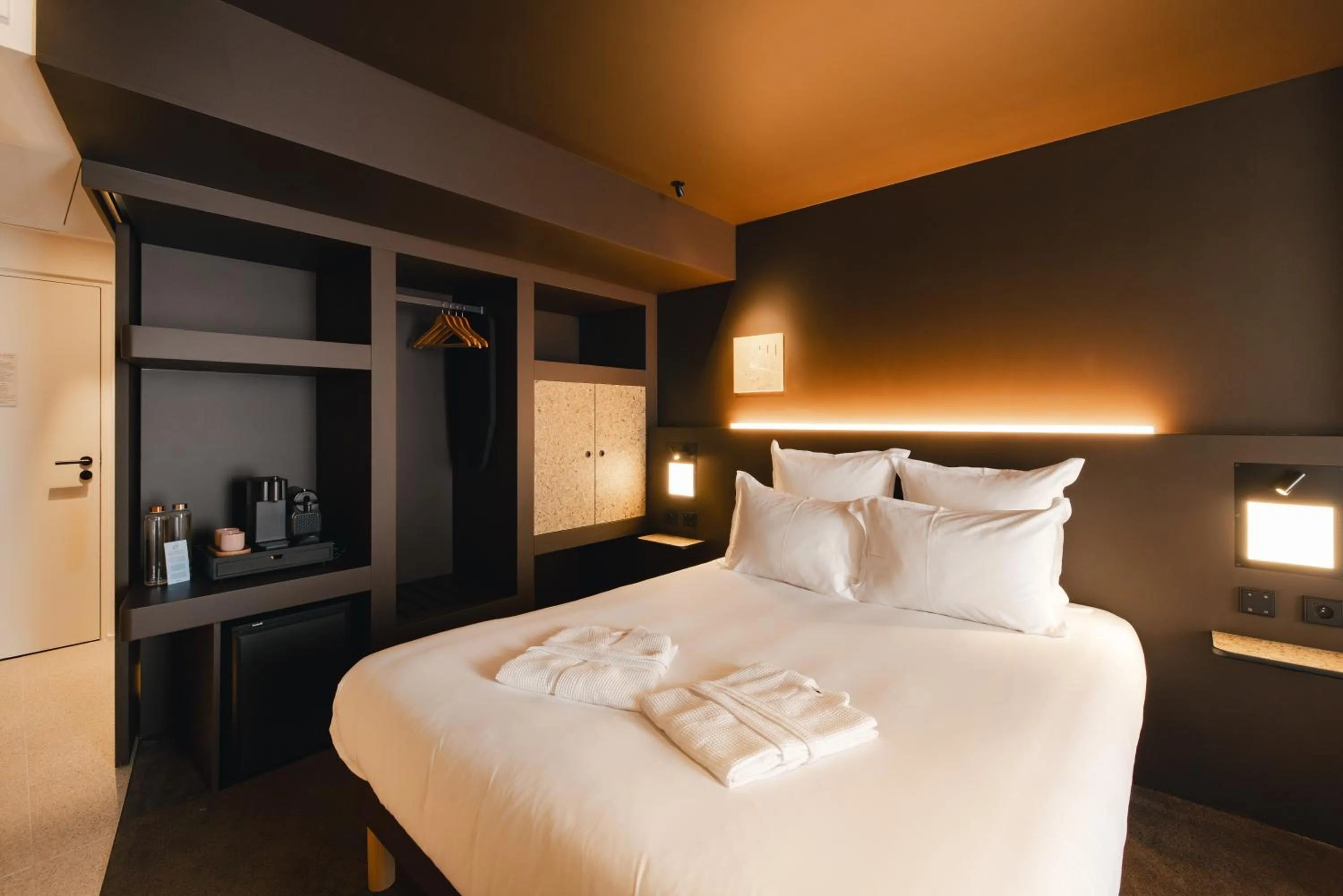 Bed in Bizipoz Hôtel