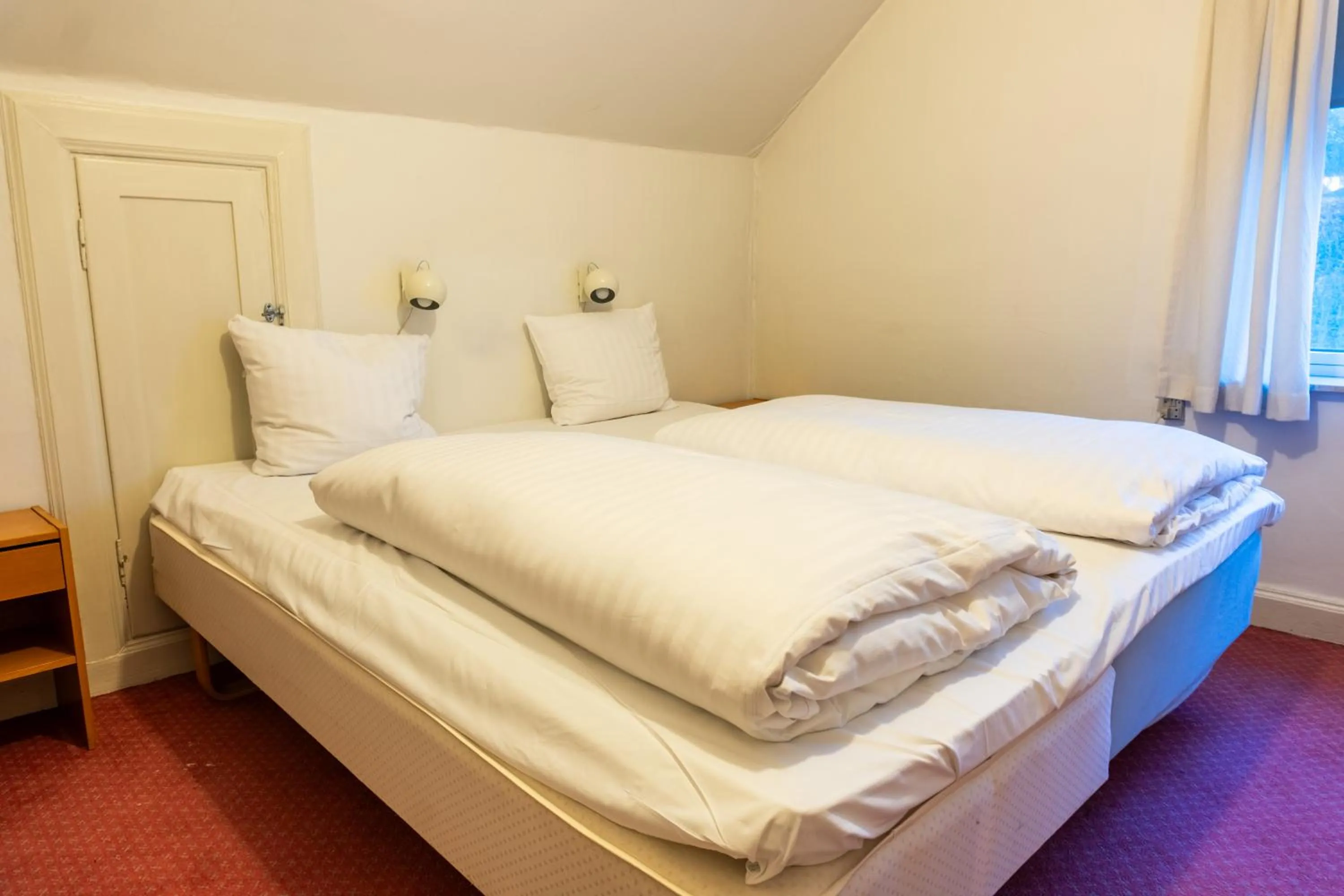 Bed in Villa Apartments Viborg