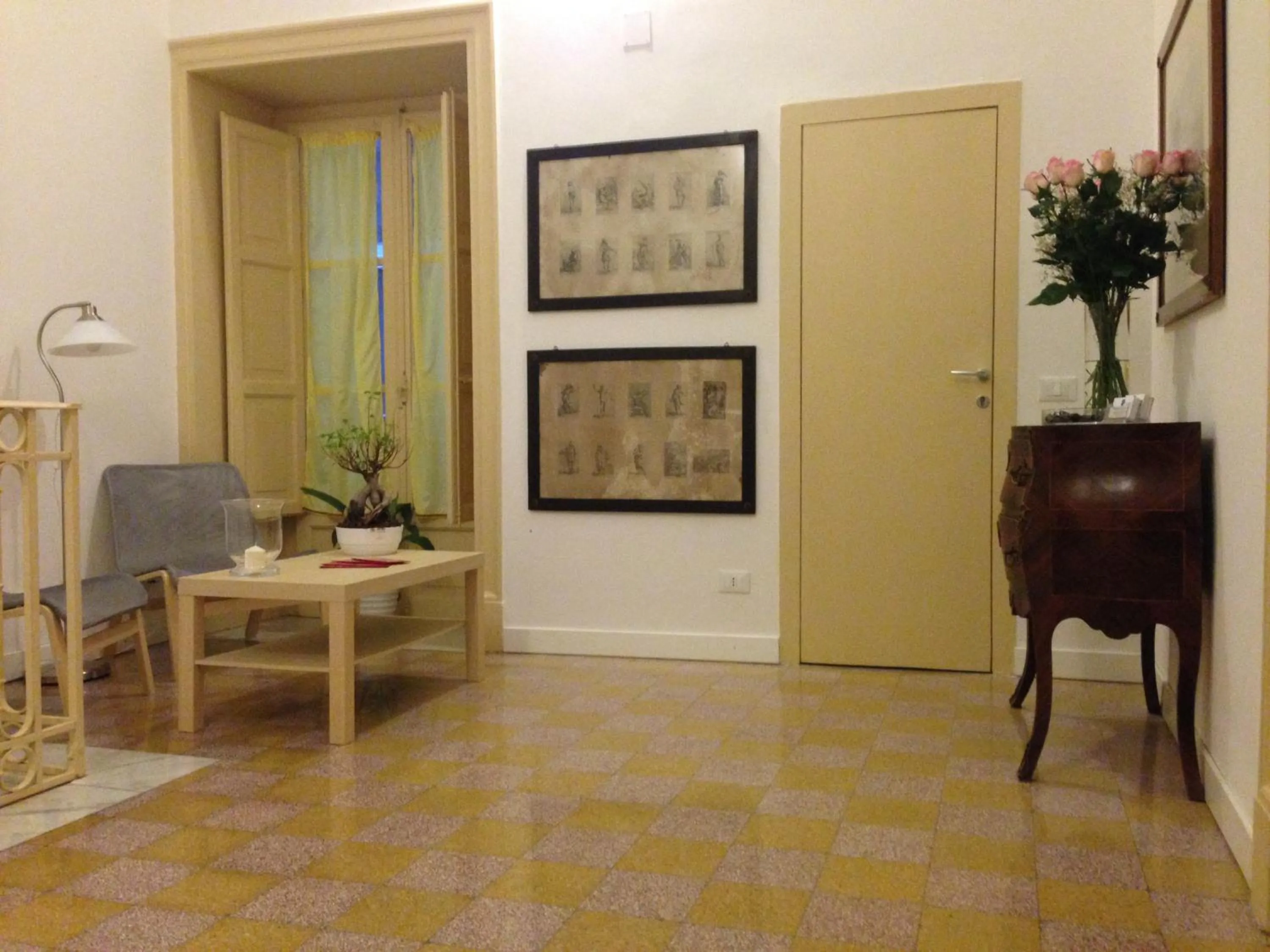 Communal lounge/ TV room in B&B Giulio Cesare 24