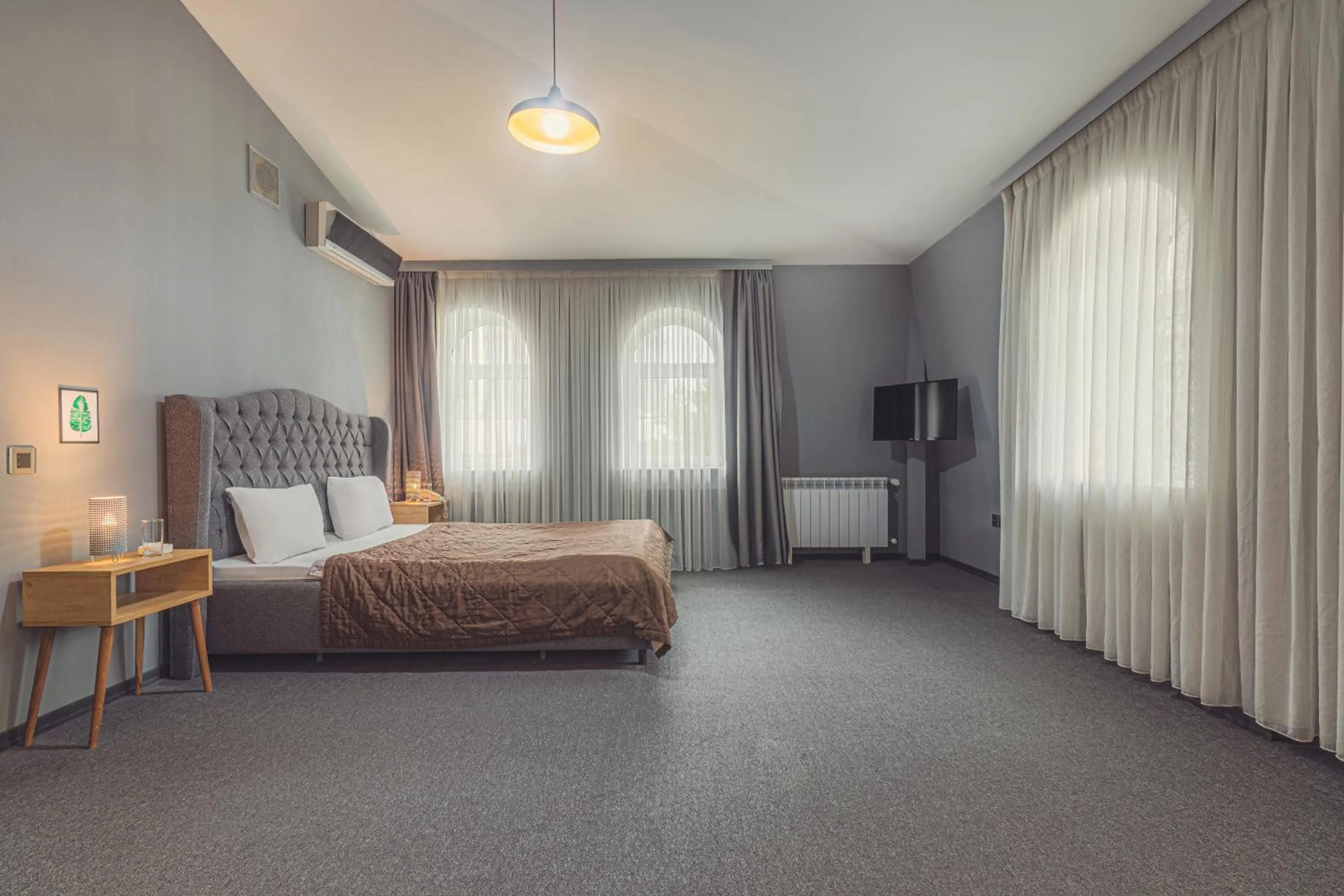 Bed in Maestro Hotel