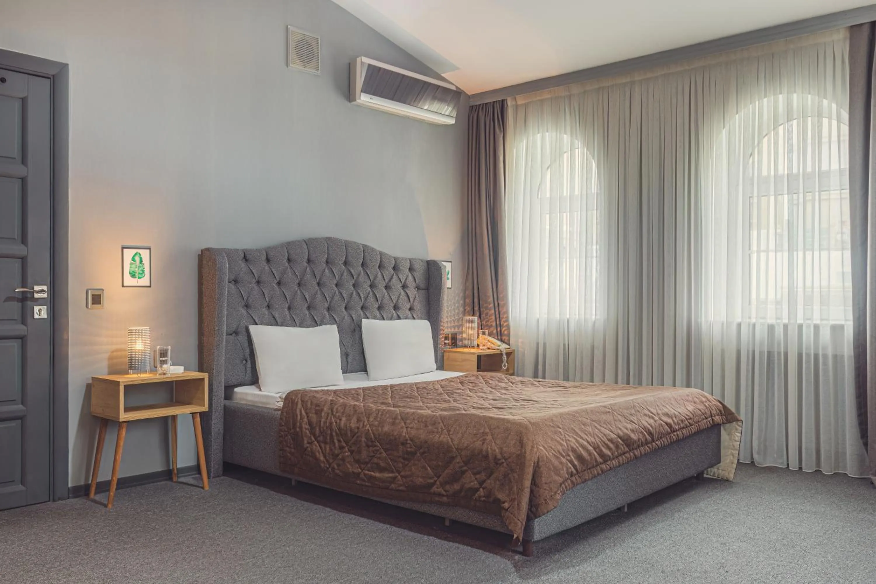 Bed in Maestro Hotel