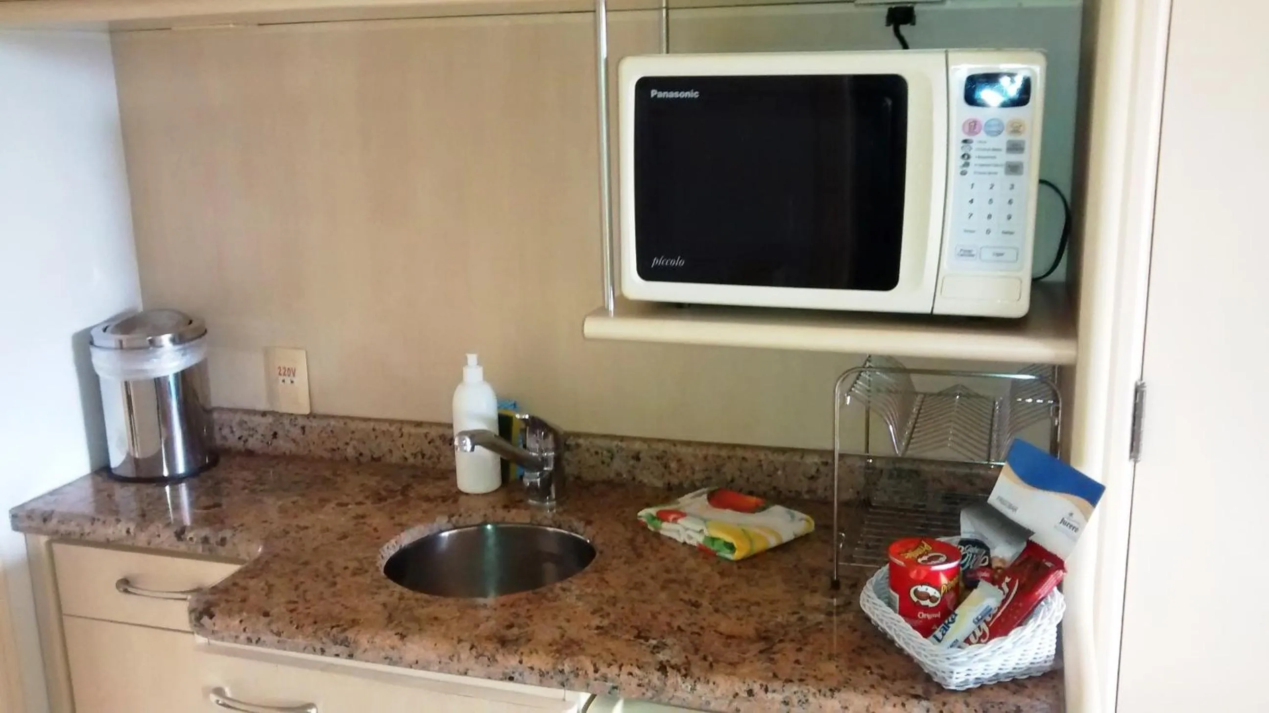 Kitchen or kitchenette in Jurerê Beach Village Studios Para Temporada