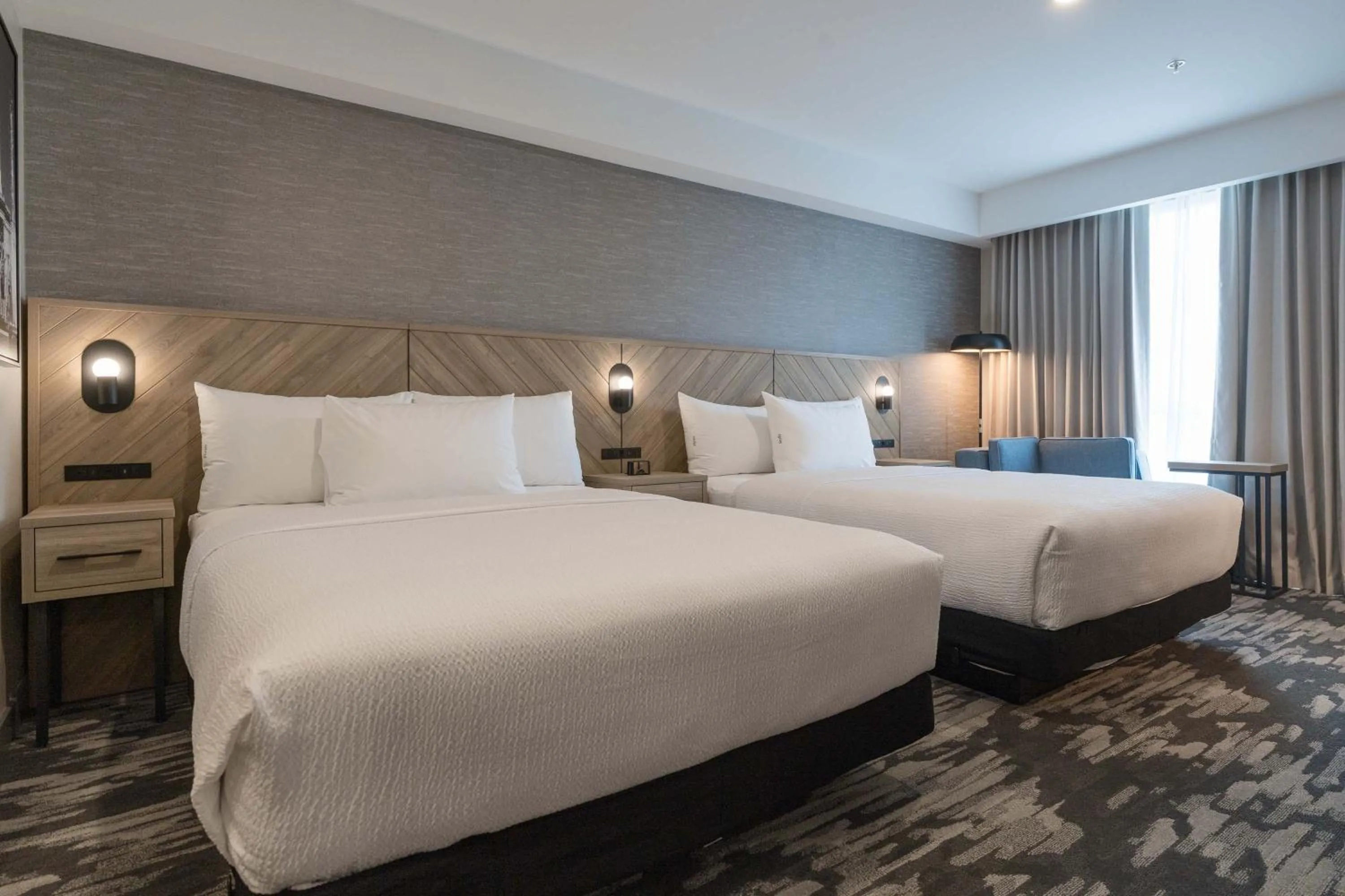 Standard Room, 2 Queen Beds, Kitchenette in Sandman Signature Winnipeg Airport Hotel & Suites