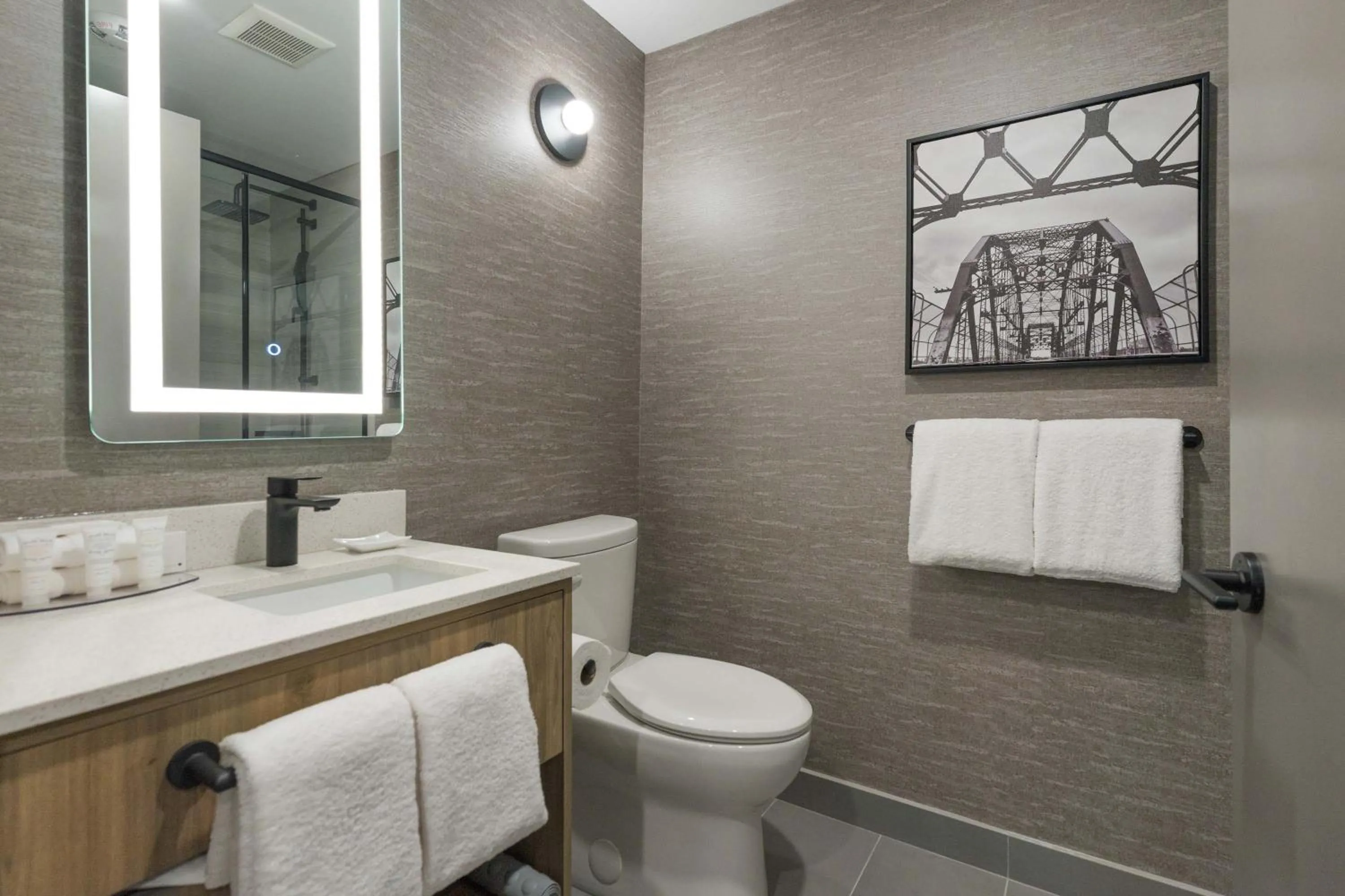 Bathroom in Sandman Signature Winnipeg Airport Hotel & Suites