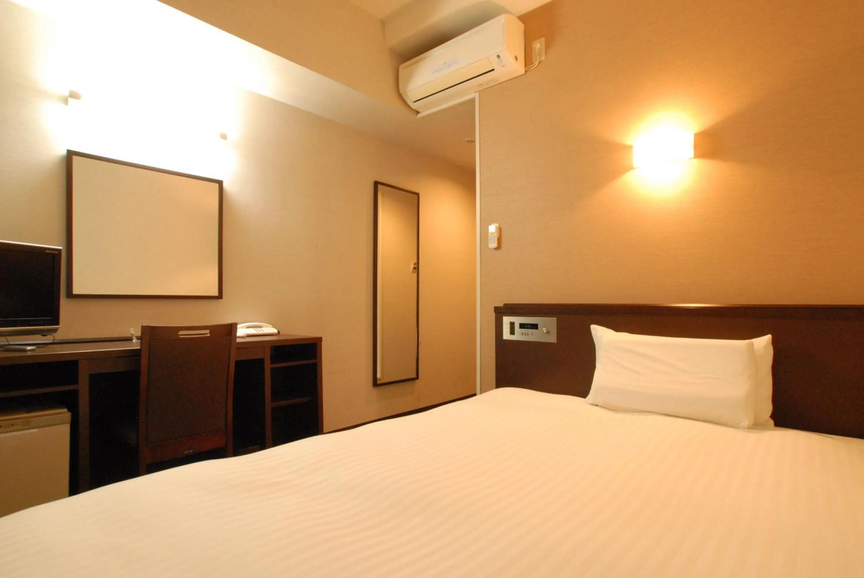 Bed in AB Hotel Mikawa Anjo Minamikan