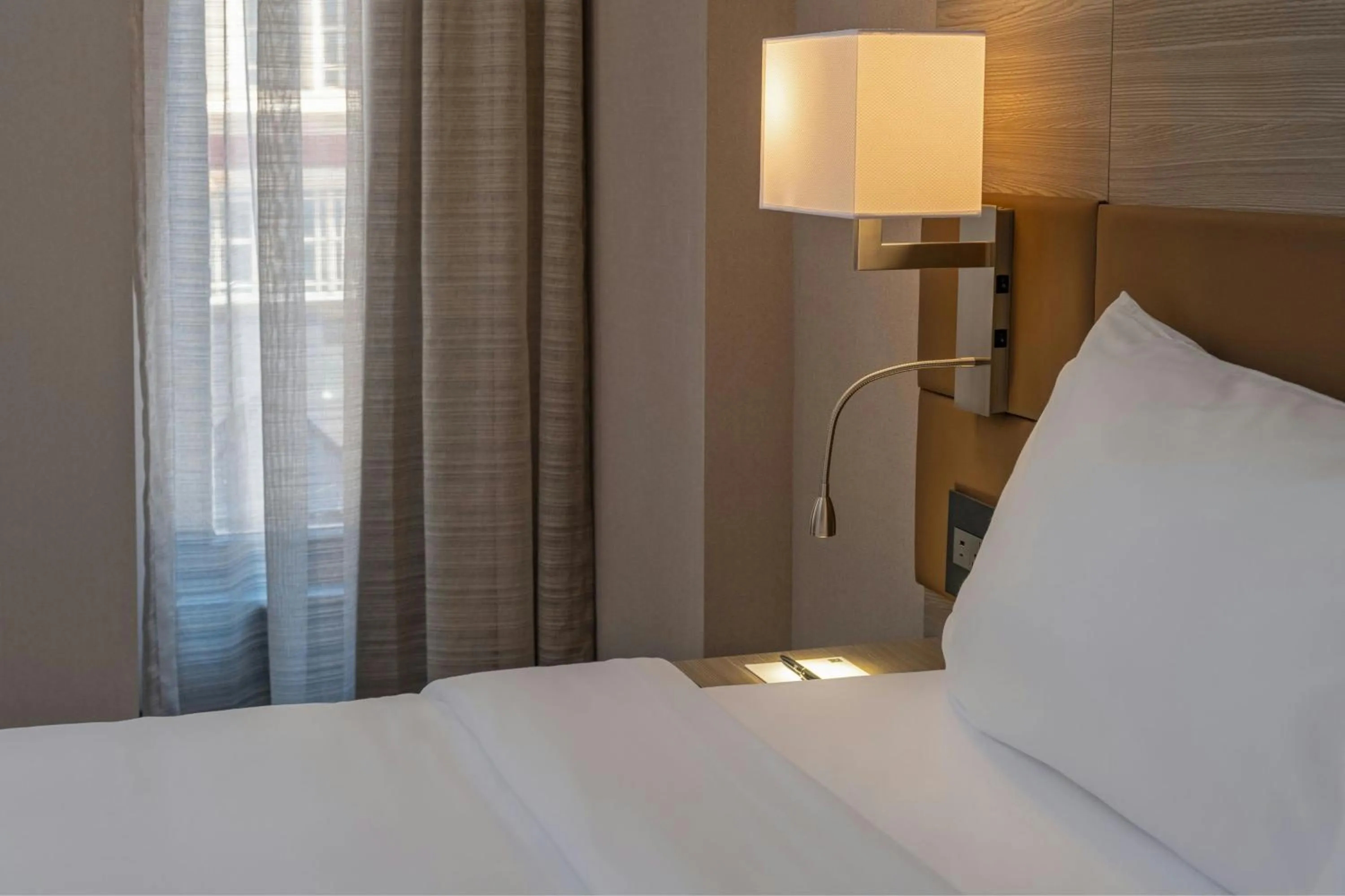 Photo of the whole room, Bed in AC Hotel by Marriott Wichita Downtown