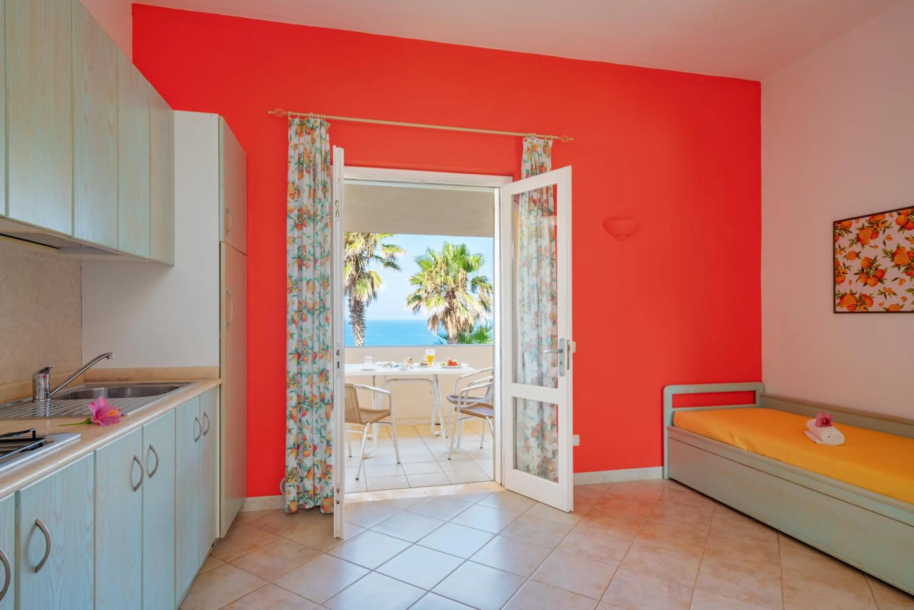 Kitchen or kitchenette, Bed in Hotel Villaggio Cala Di Volpe