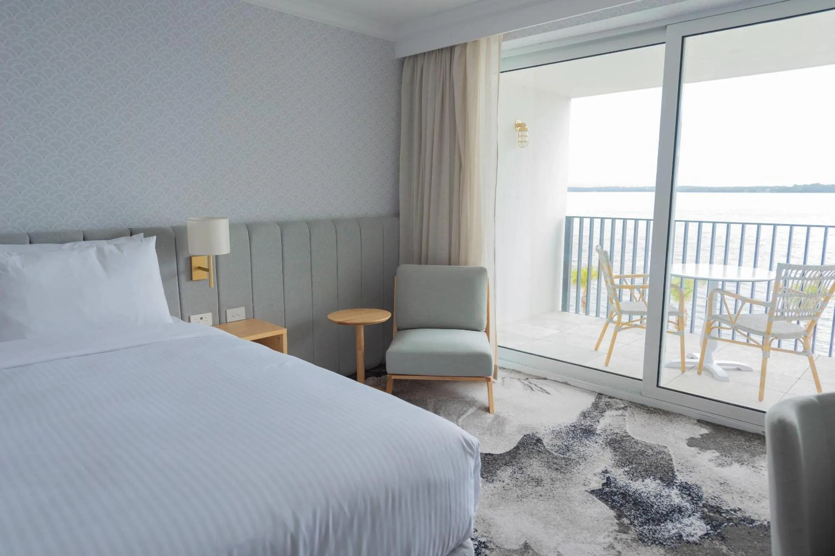 Bedroom, Bed in The Beachcomber Hotel & Resort, an Ascend Collection Resort