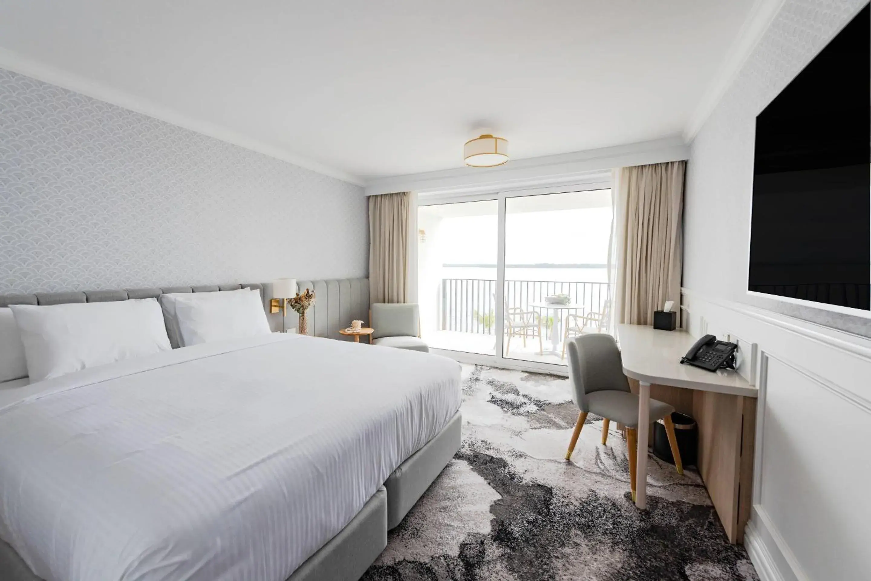 Bedroom, Bed in The Beachcomber Hotel & Resort, an Ascend Collection Resort Bedroom, Bed in The Beachcomber Hotel & Resort, an Ascend Collection Resort