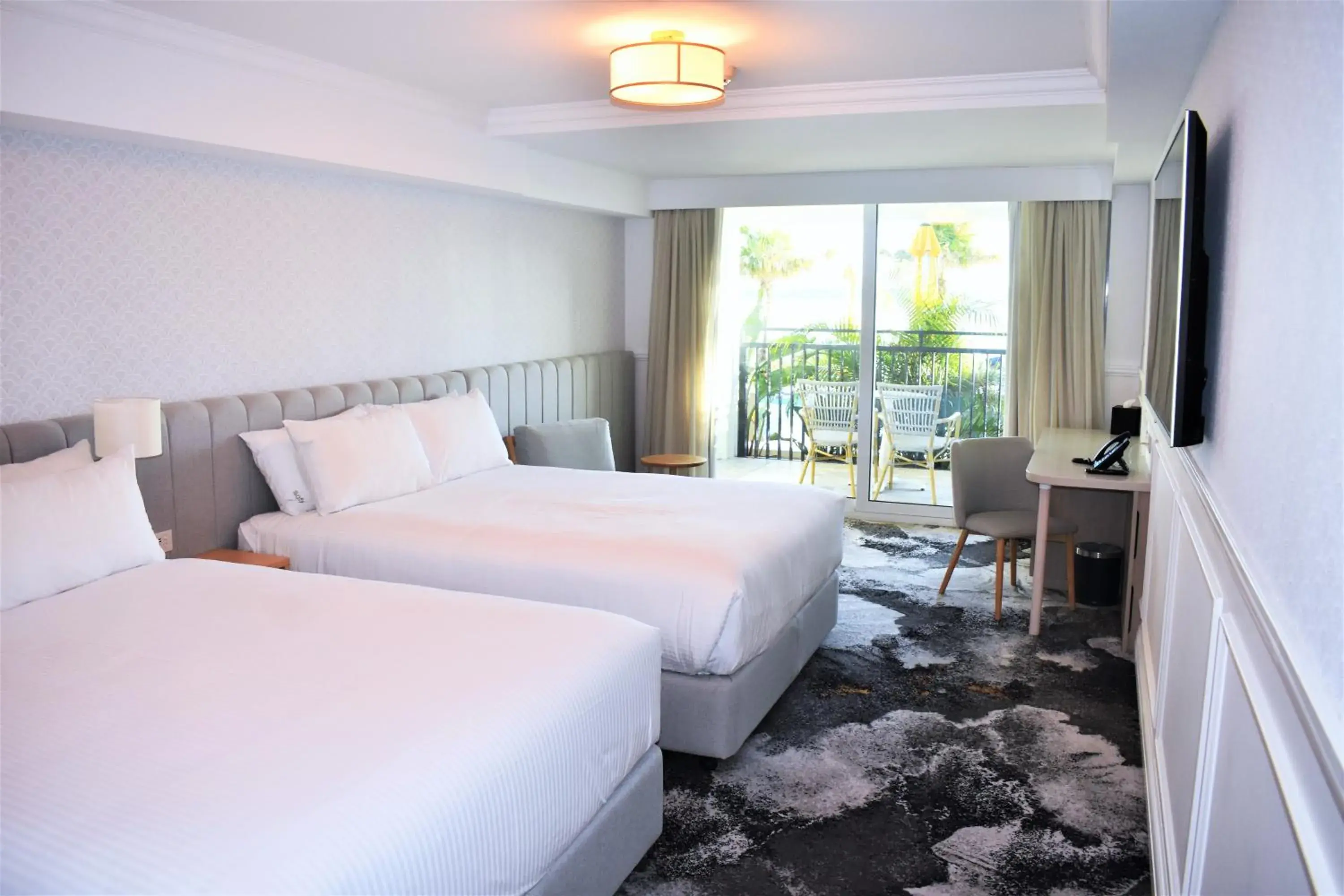Bed in The Beachcomber Hotel & Resort, an Ascend Collection Resort Bed in The Beachcomber Hotel & Resort, an Ascend Collection Resort