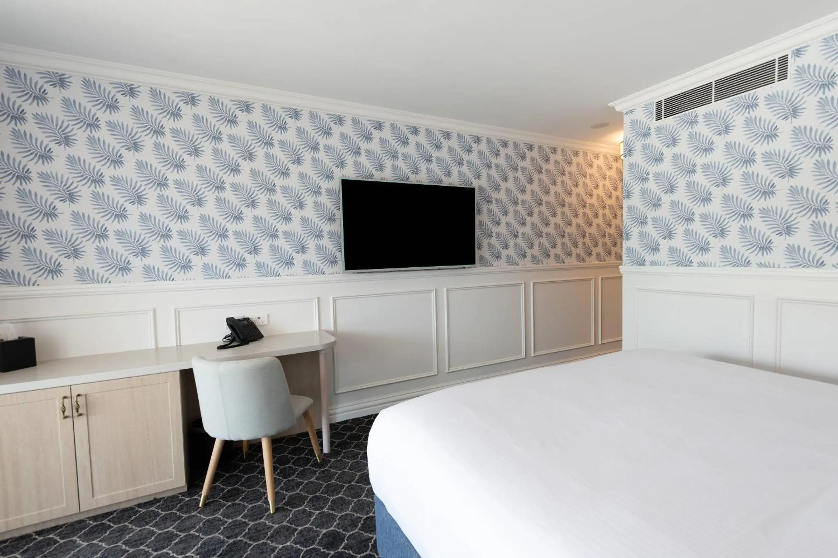 Bedroom, Bed in The Beachcomber Hotel & Resort, an Ascend Collection Resort Bedroom, Bed in The Beachcomber Hotel & Resort, an Ascend Collection Resort