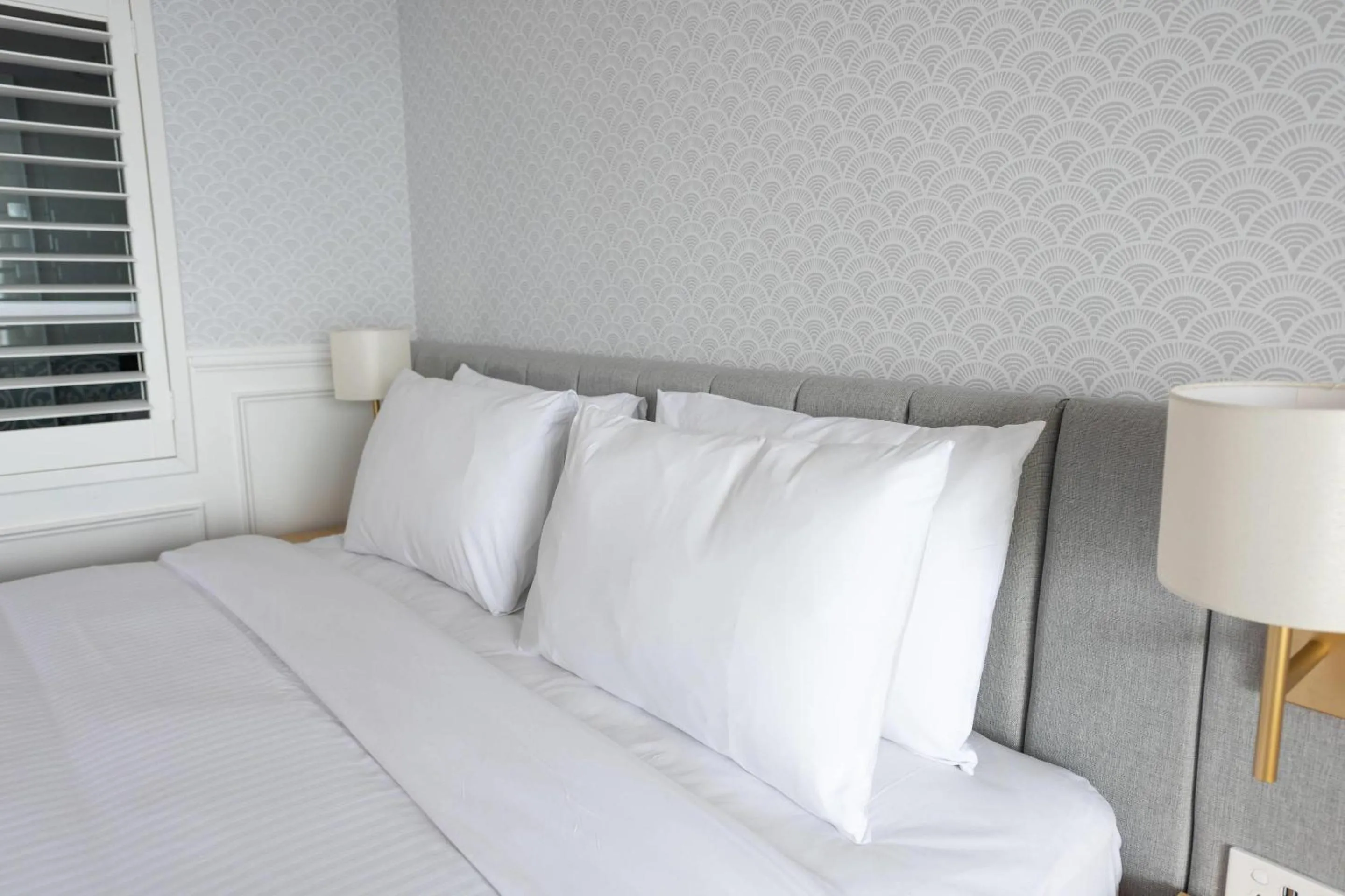 Bedroom, Bed in The Beachcomber Hotel & Resort, an Ascend Collection Resort