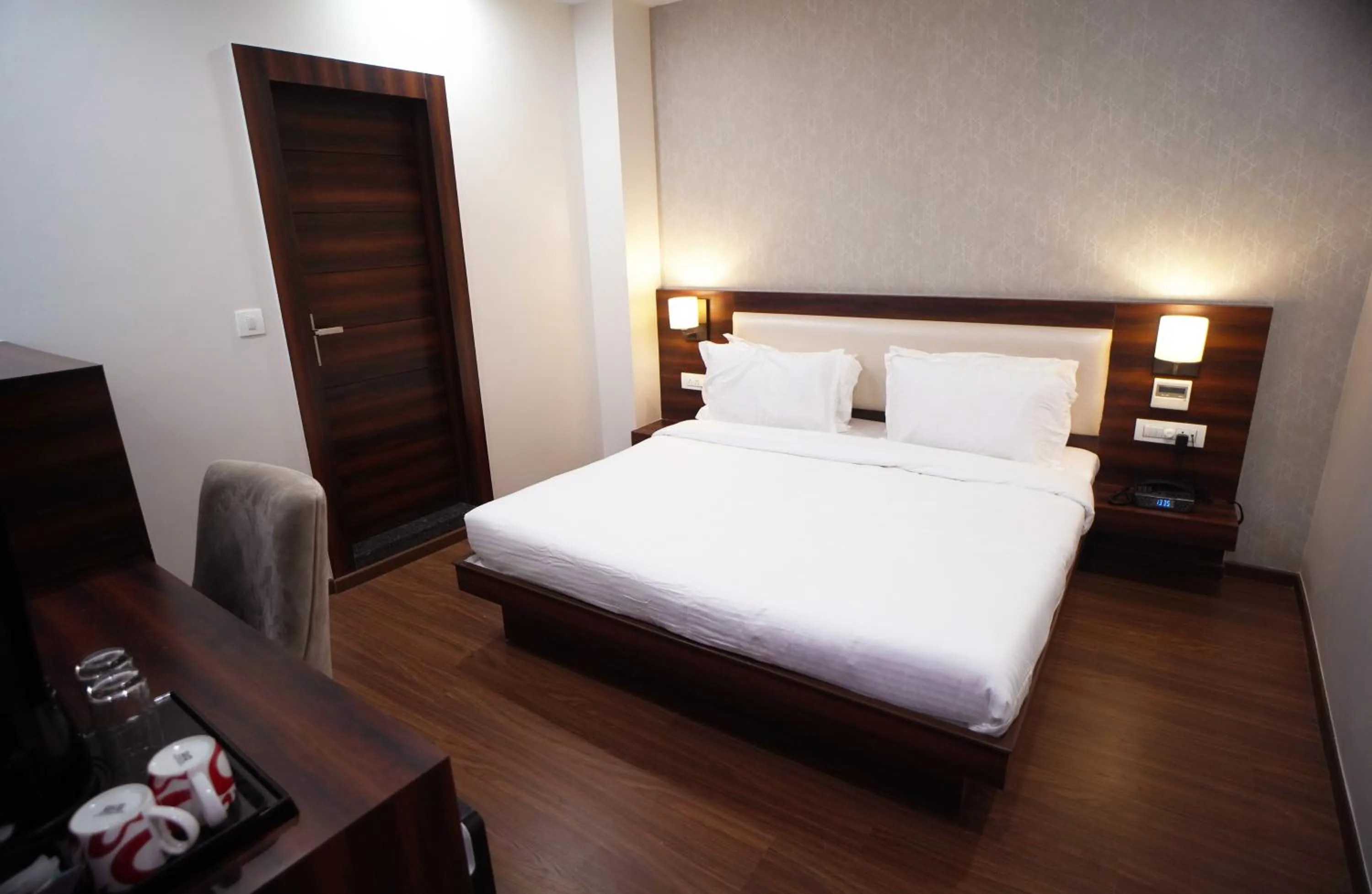 Photo of the whole room, Bed in Sai Maa Hotel & Residency