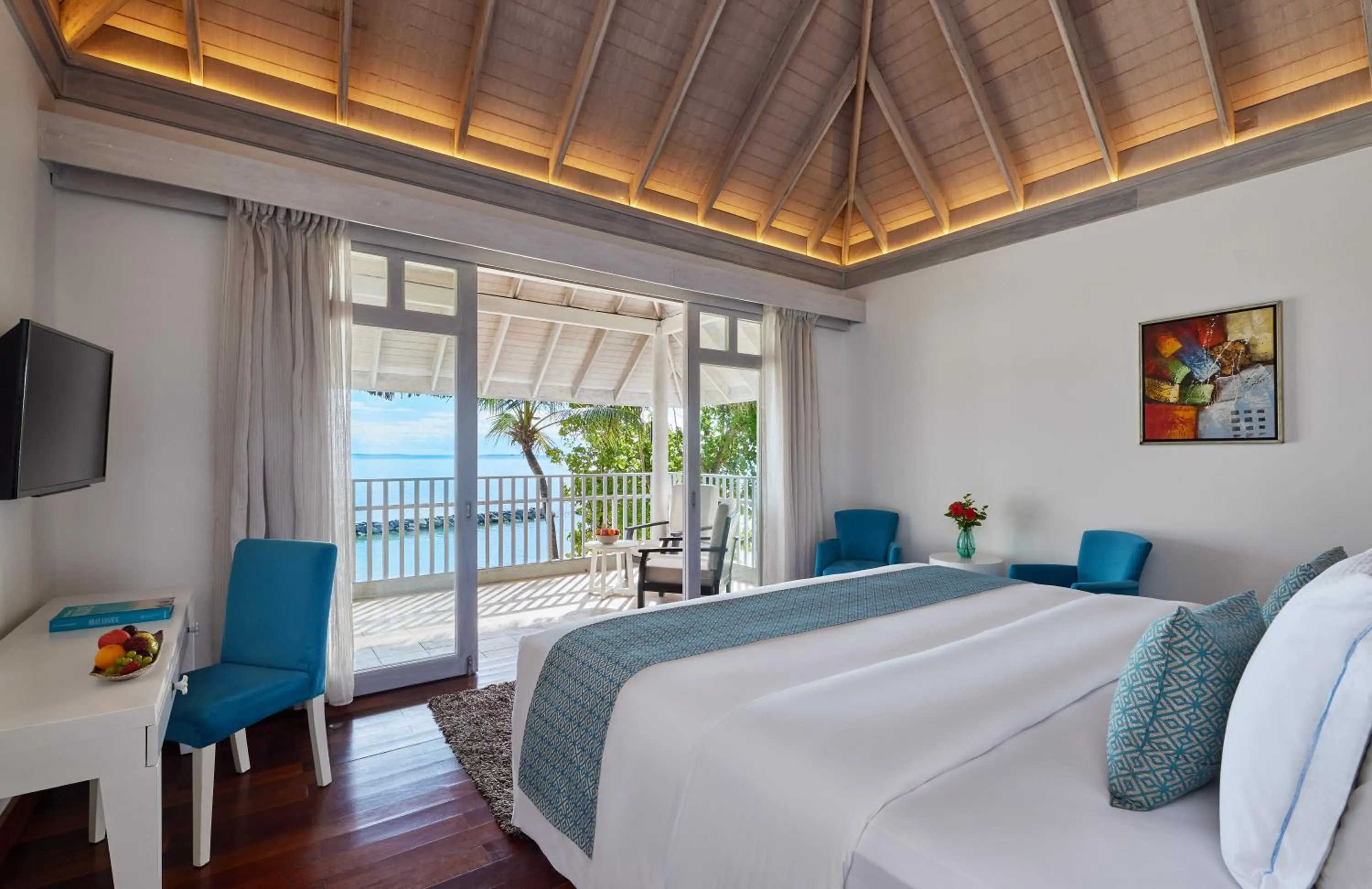 Bed in NH Maldives Kuda Rah Resort