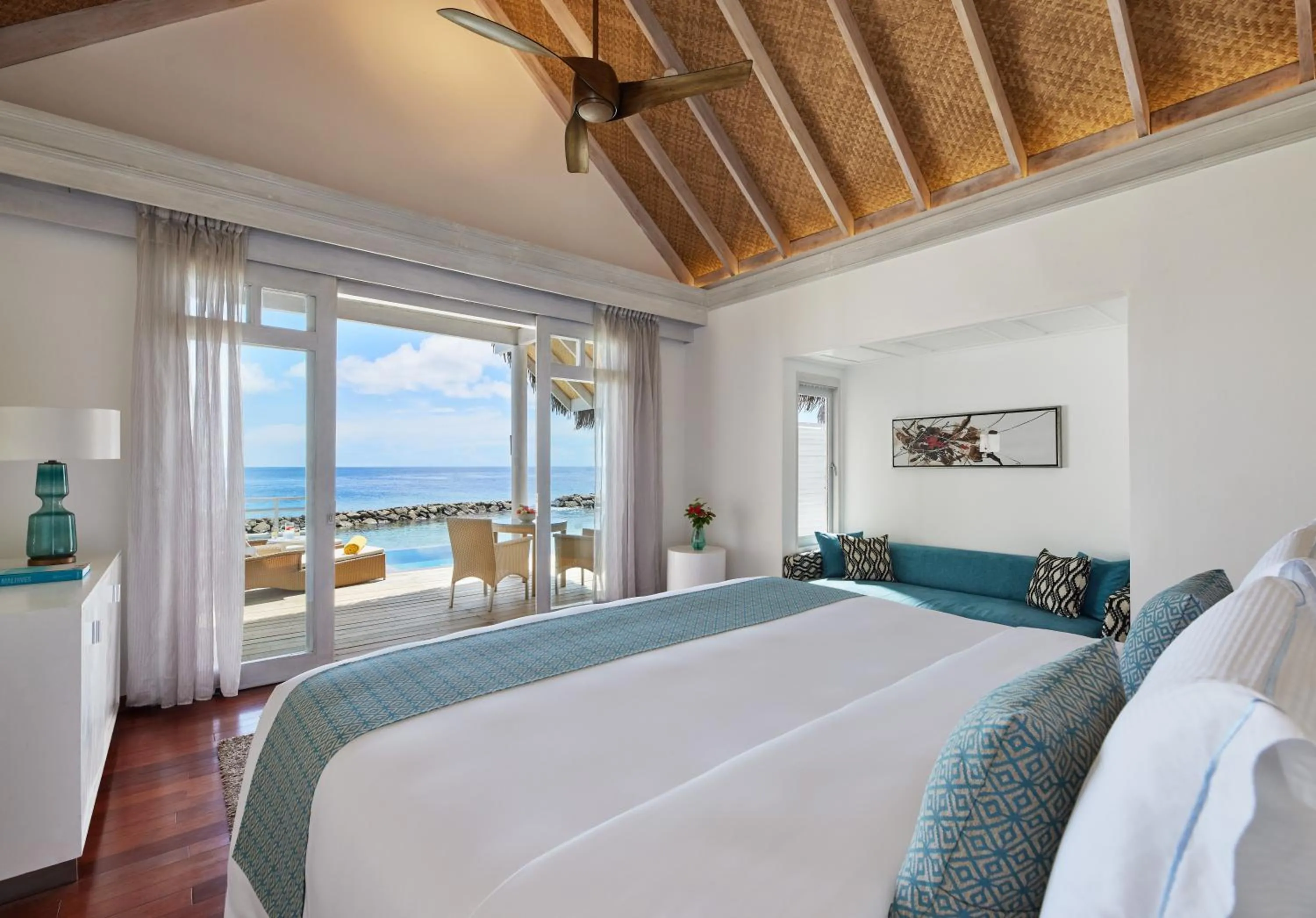 Bed in NH Maldives Kuda Rah Resort