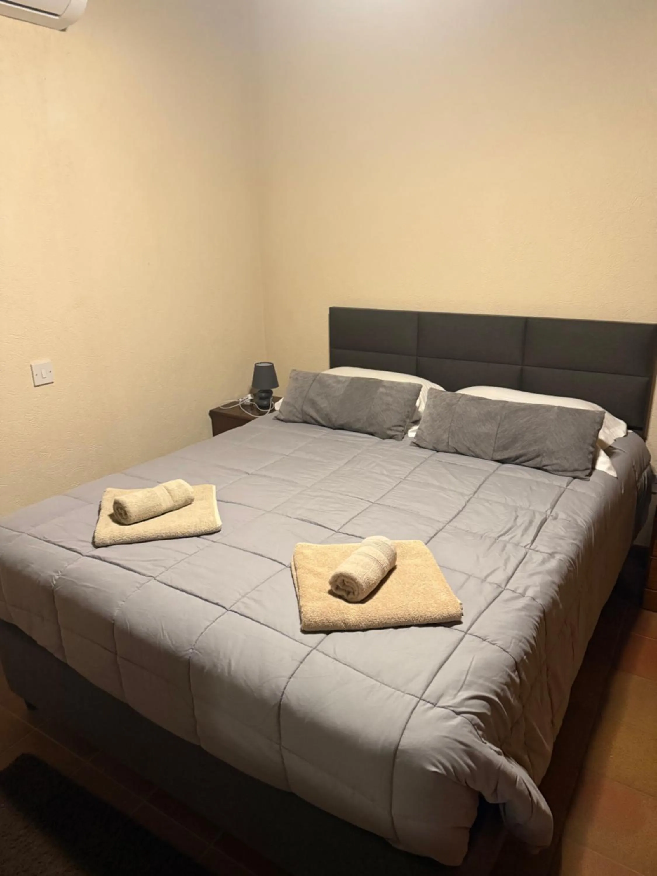 Bed in Omodos Village Houses