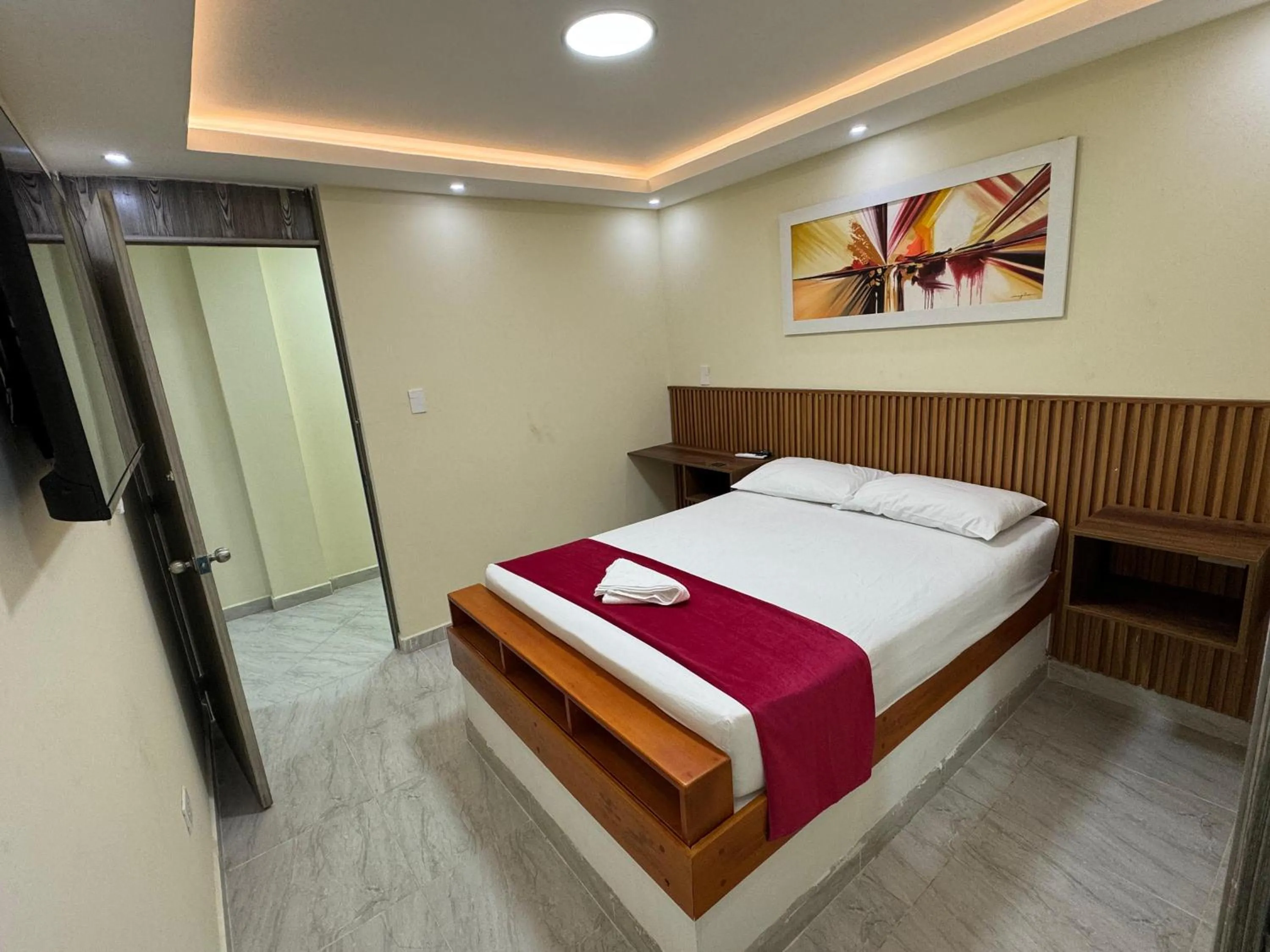 Bed in Hotel Magistral Suiter