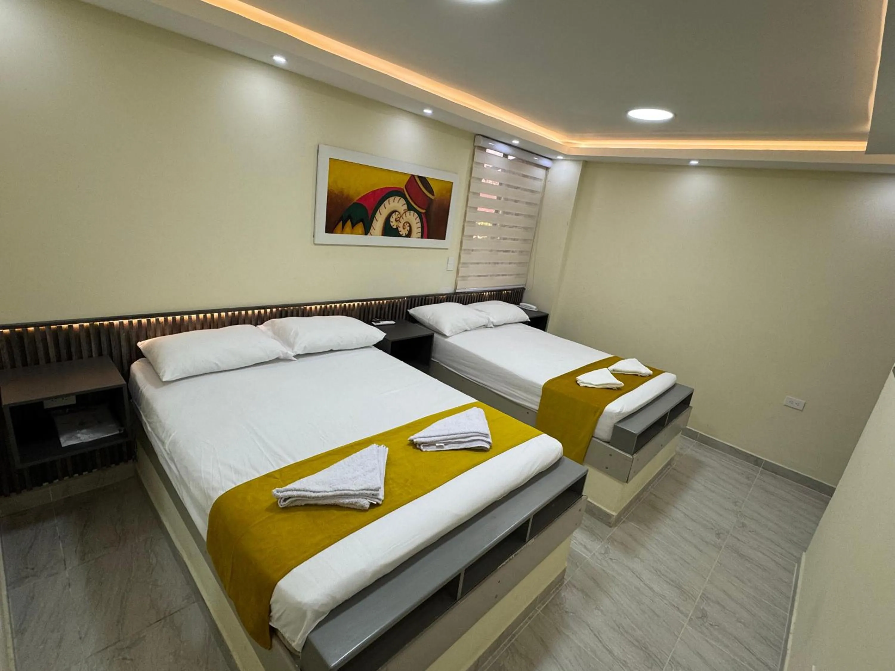 Bed in Hotel Magistral Suiter