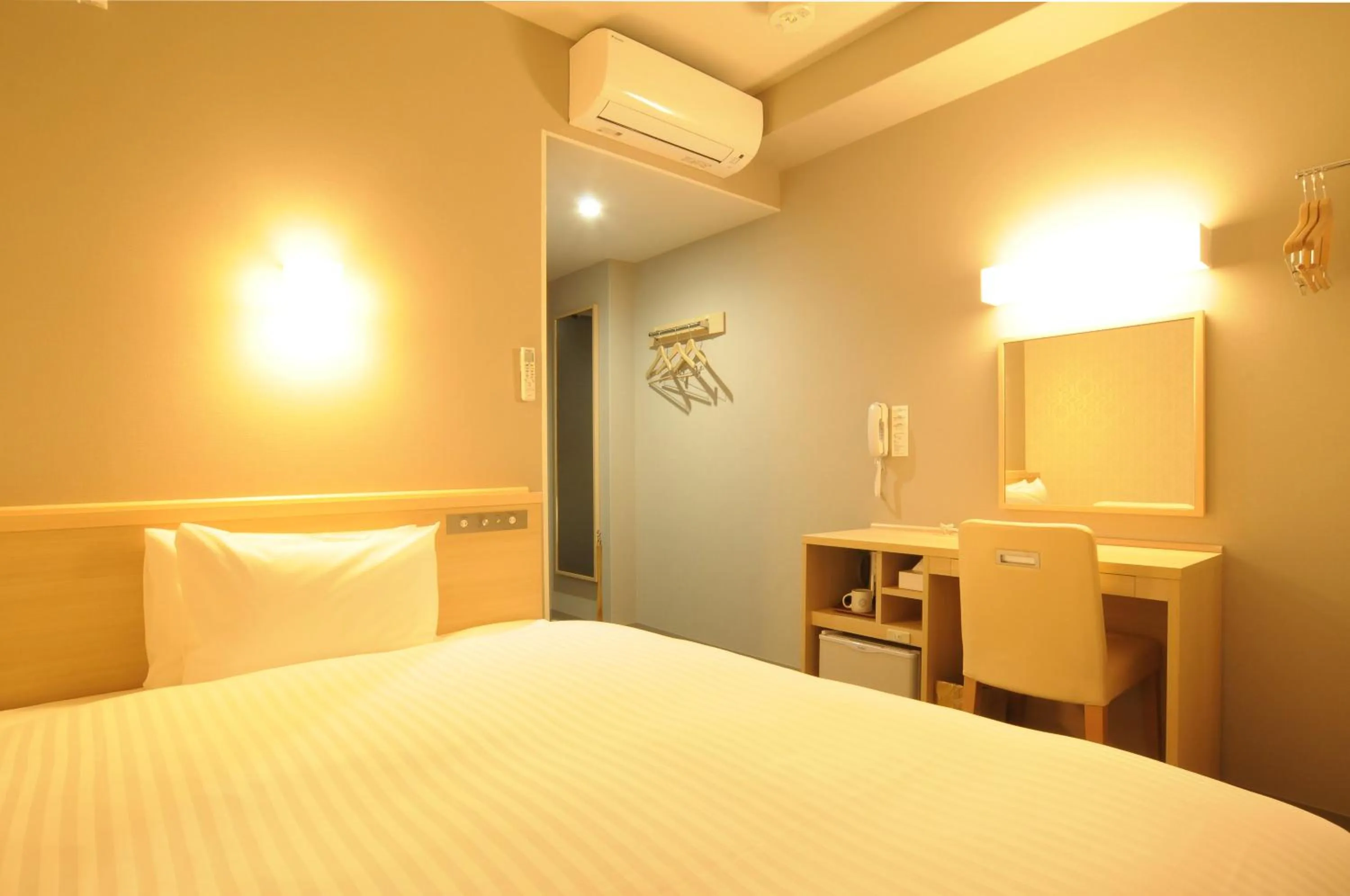 Bed in AB Hotel Tahara