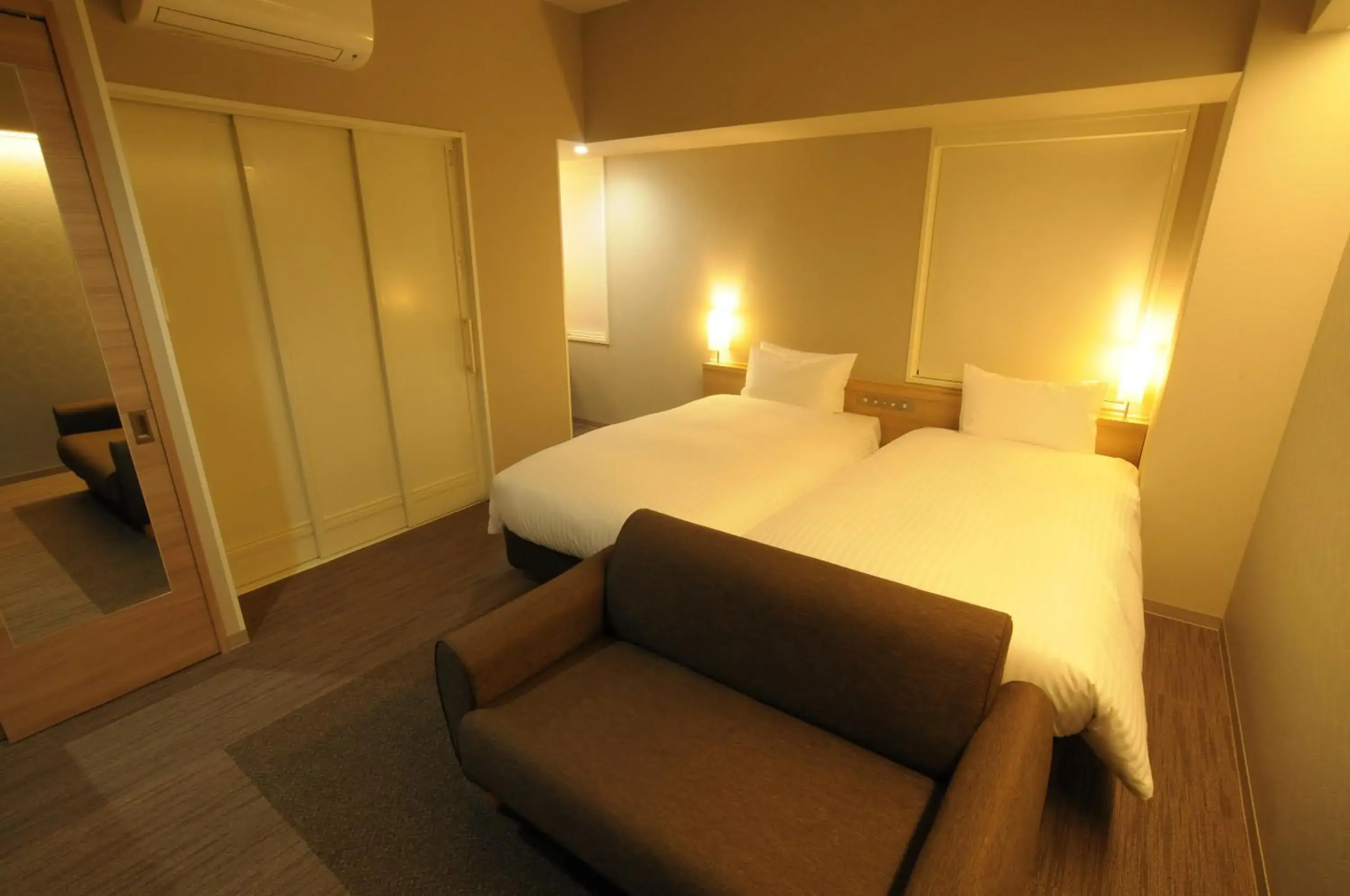 Bed in AB Hotel Tahara Bed in AB Hotel Tahara