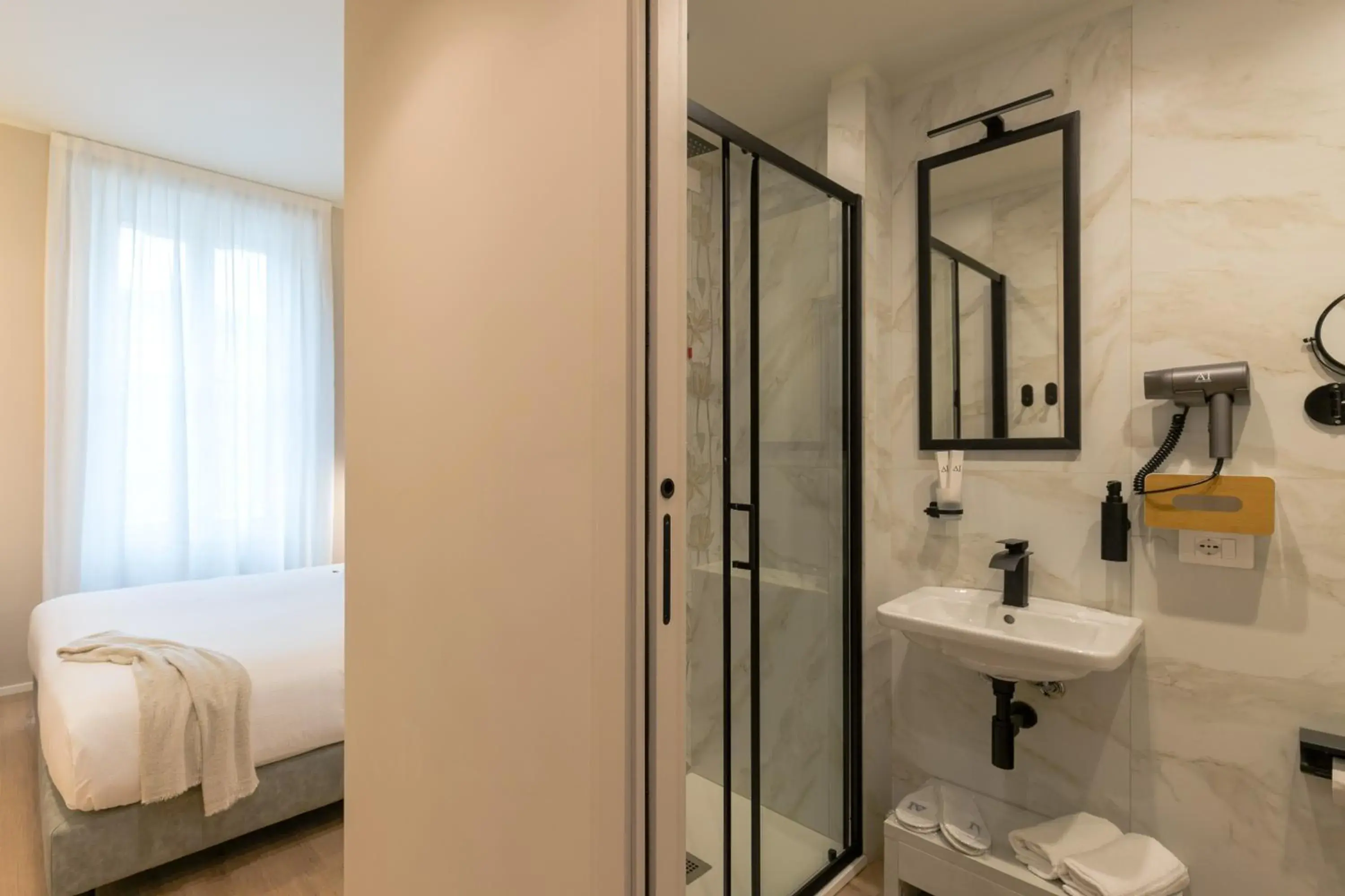 Shower, Bed in Aiello Hotels - Isola Design District Shower, Bed in Aiello Hotels - Isola Design District