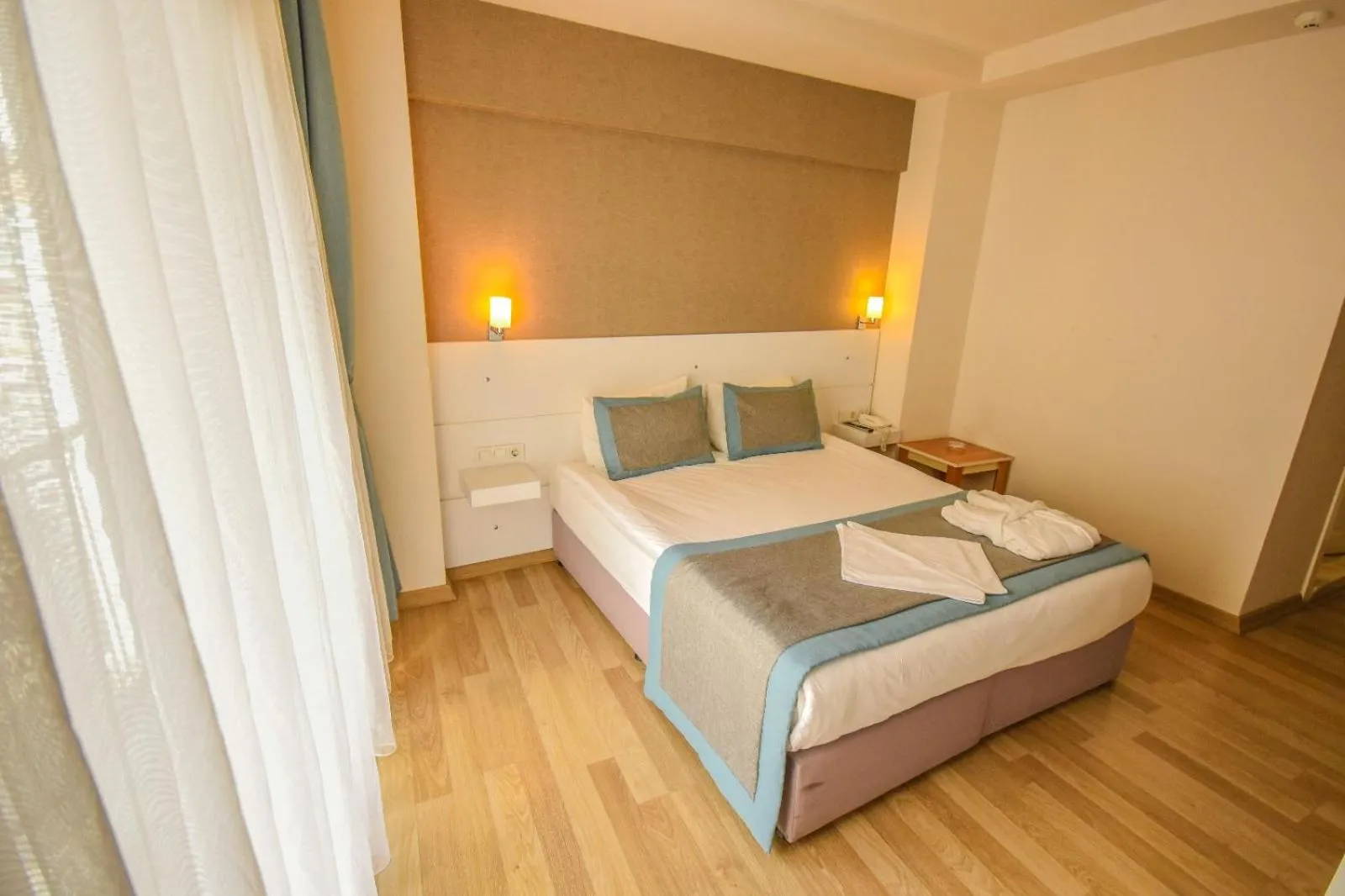 Bed in ParionHouse Hotel