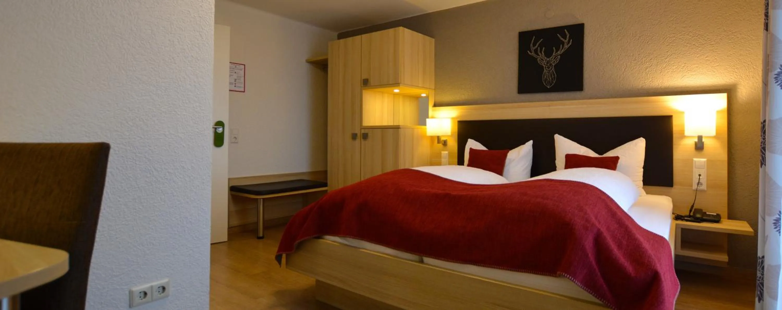 Photo of the whole room, Bed in Genusshotel Hirschen - Erholung im Grünen (Südschwarzwald)