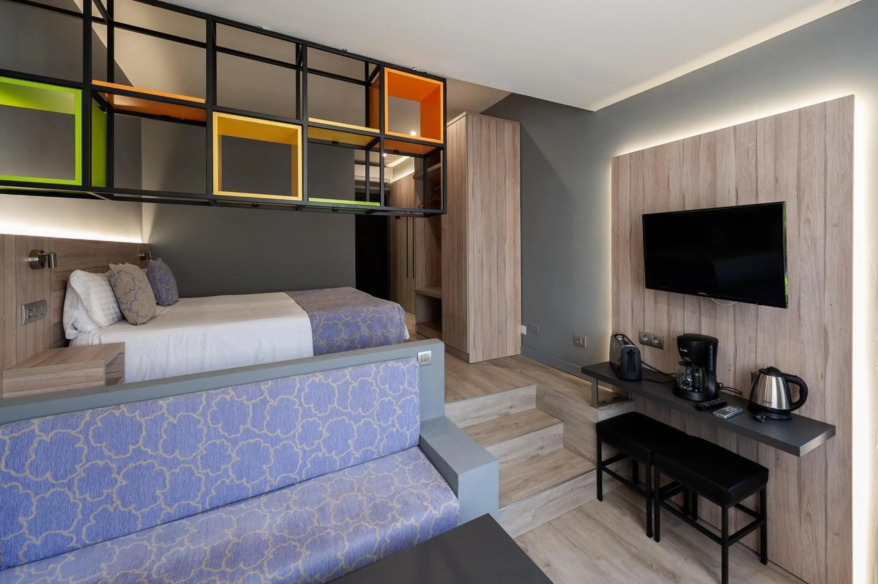 TV and multimedia, Bed in Apartamentos NataLis