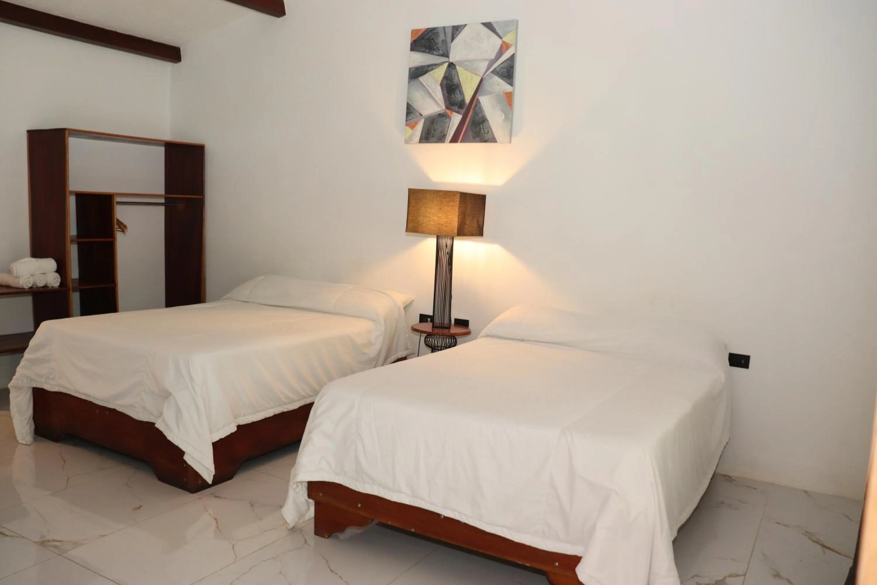 Photo of the whole room, Bed in Hotel Samoa del Sur