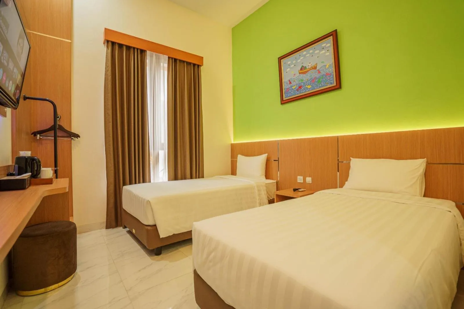 Bed in The Cabin Hotel Lovina Bali