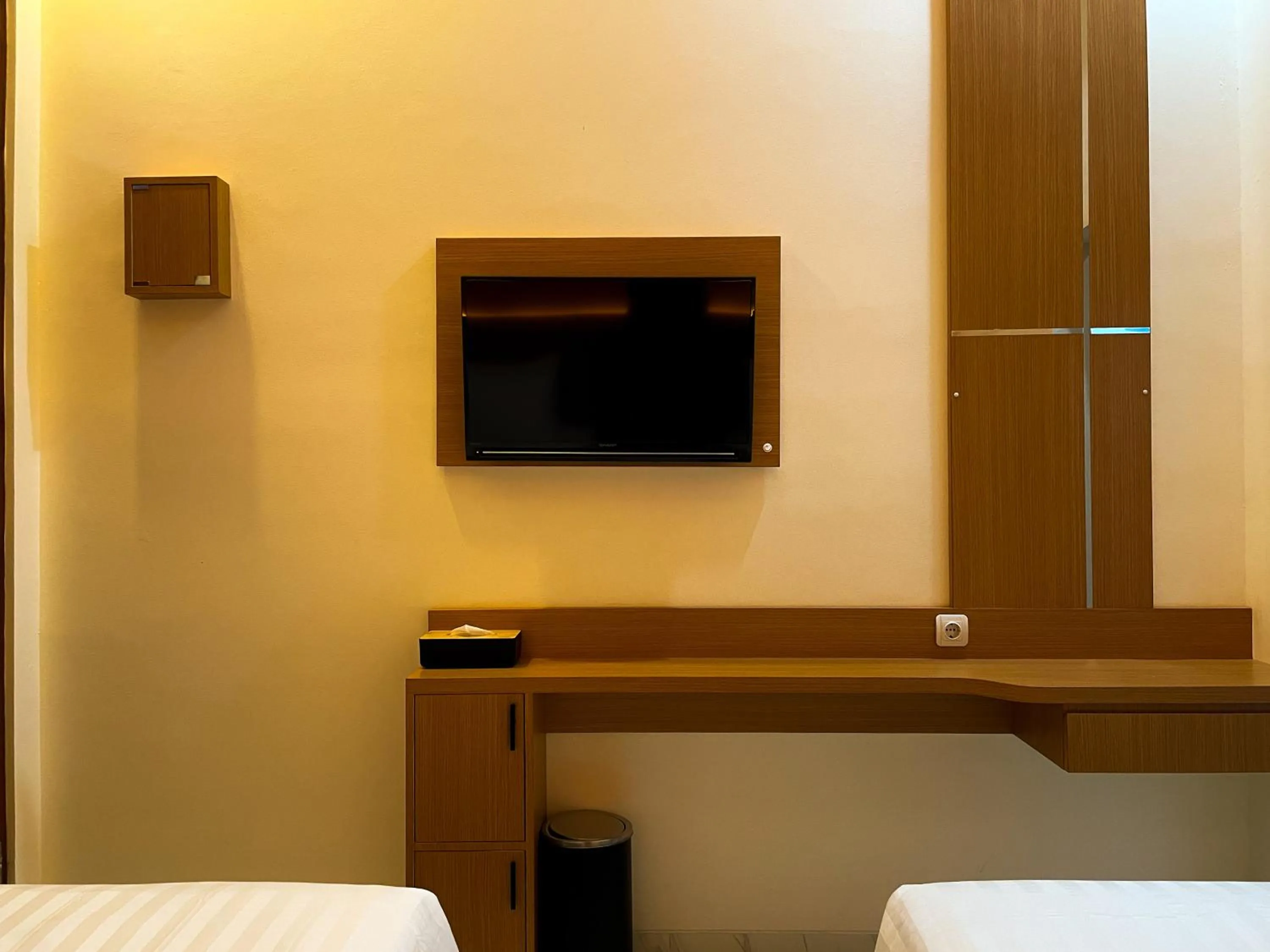 Bed in The Cabin Hotel Lovina Bali