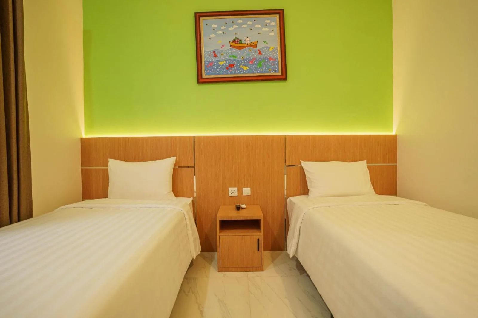 Bed in The Cabin Hotel Lovina Bali