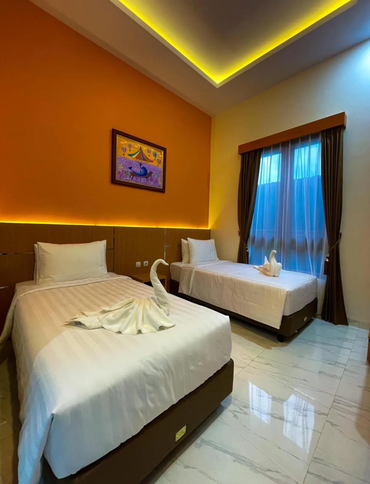 Bed in The Cabin Hotel Lovina Bali