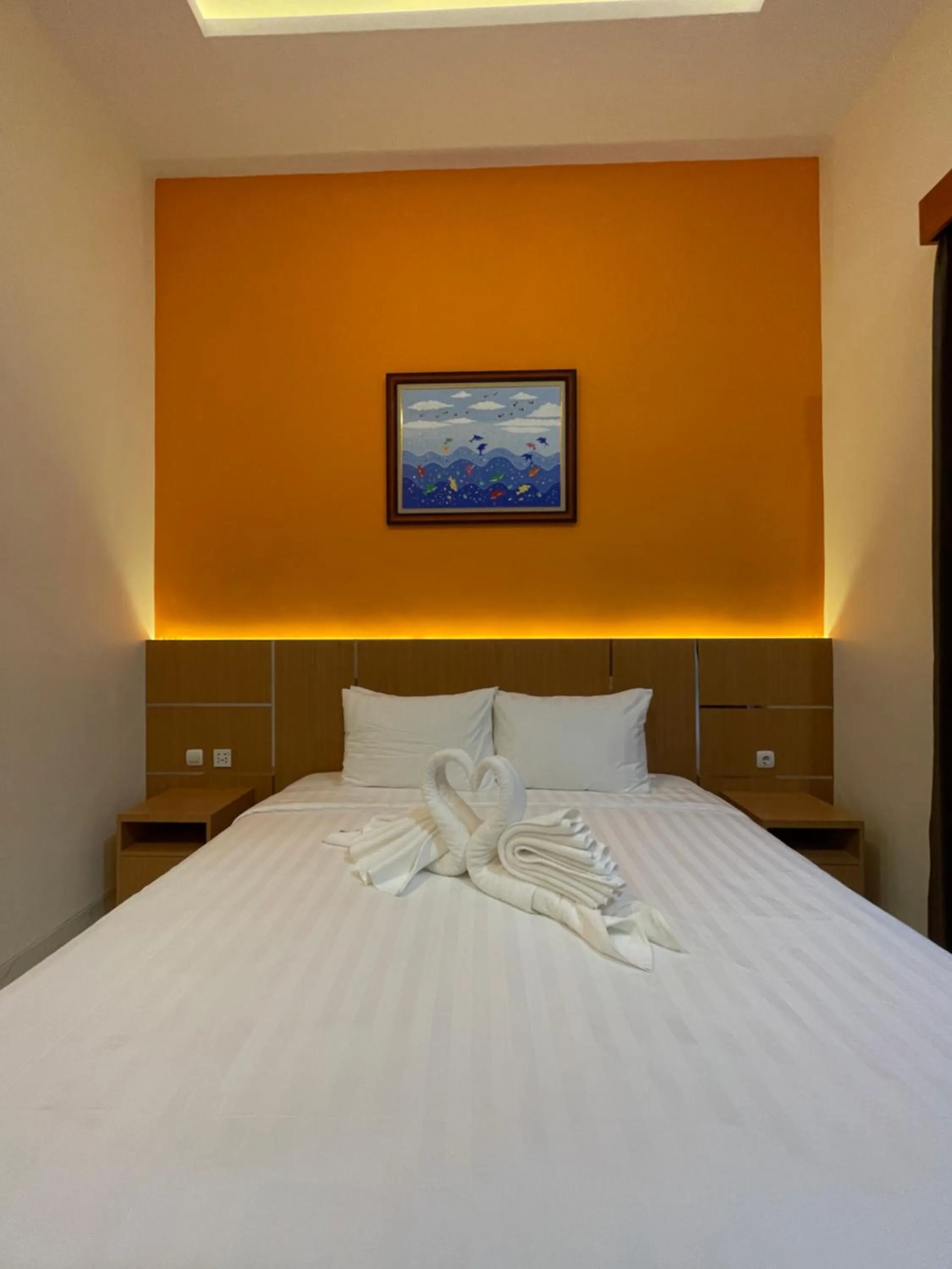 Bed in The Cabin Hotel Lovina Bali