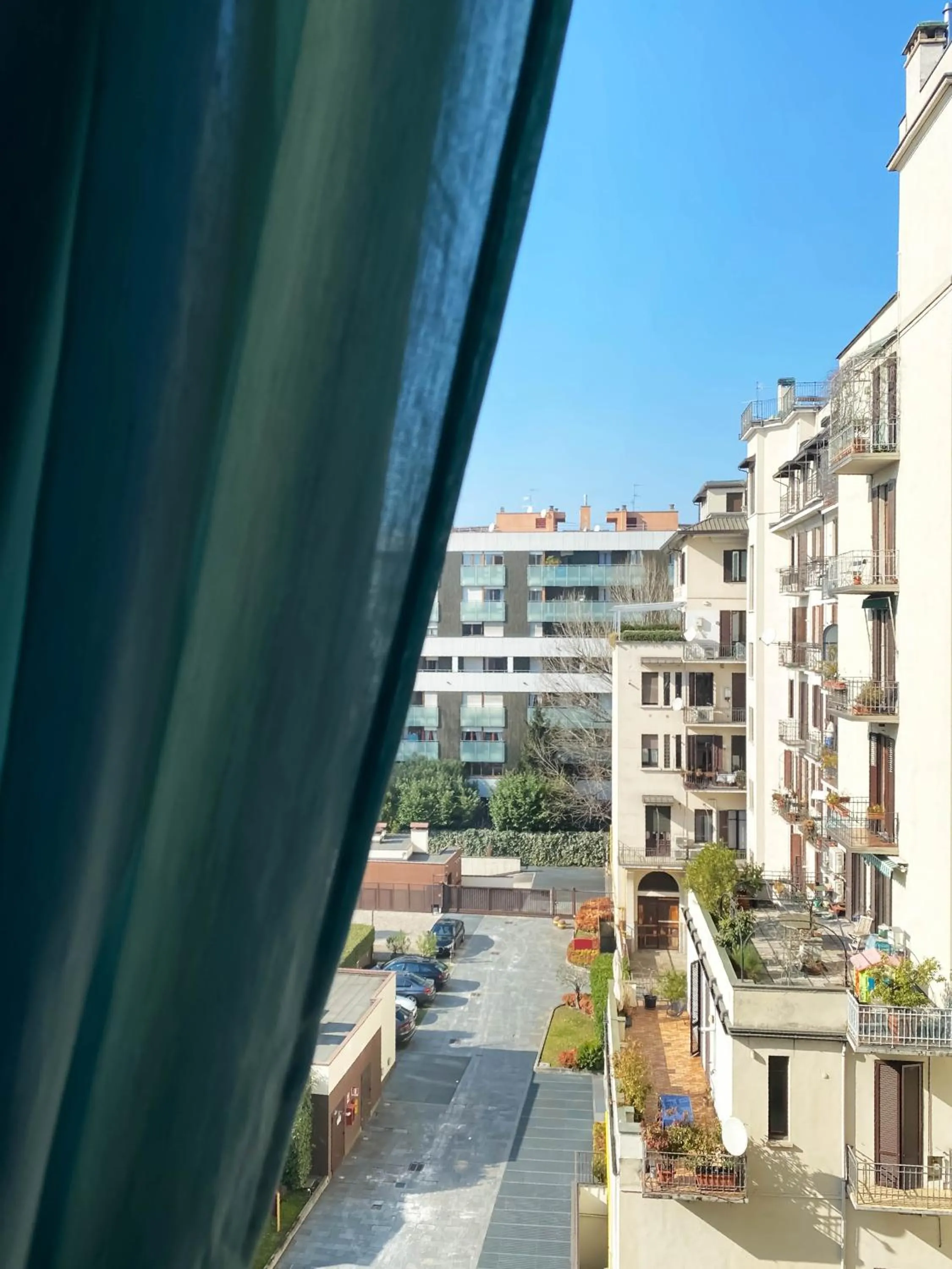 Inner courtyard view in I Am Here - Gioia 71