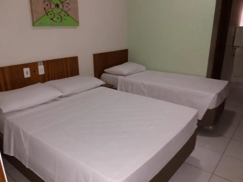 Bed in Ipê Guaru Hotel