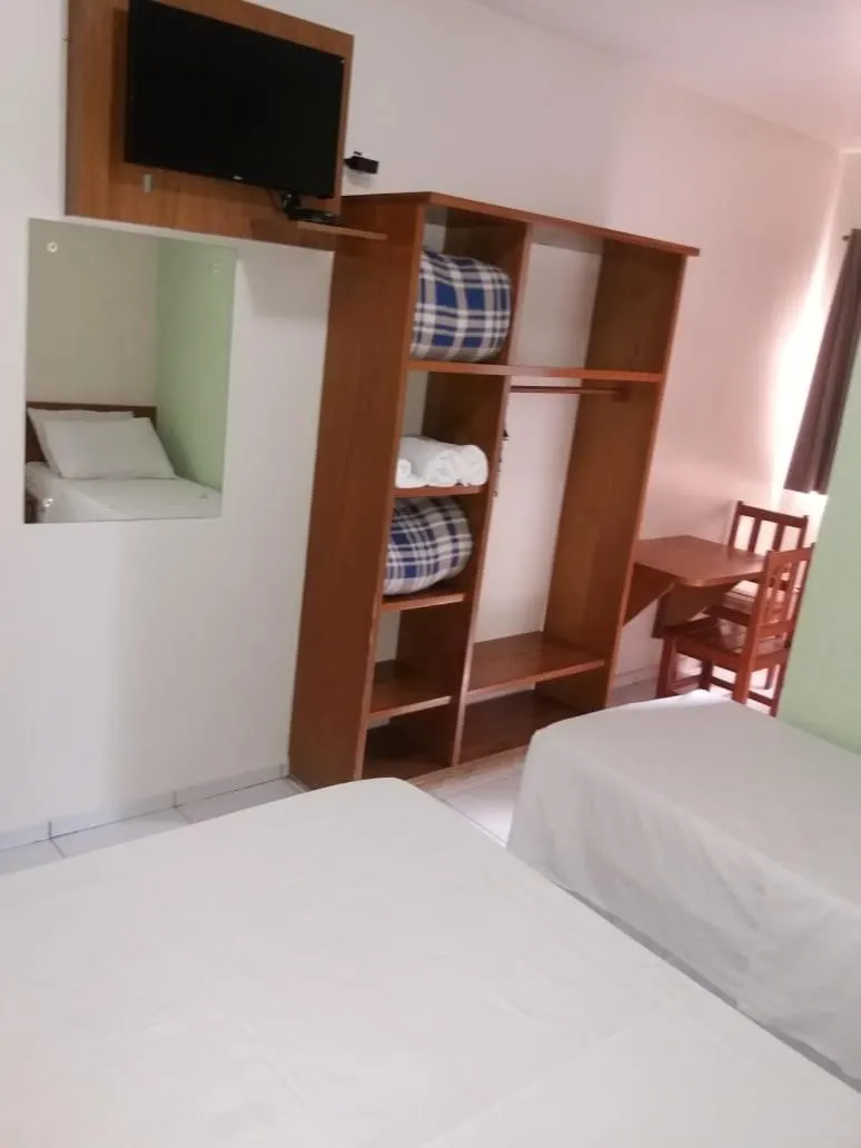Bed in Ipê Guaru Hotel