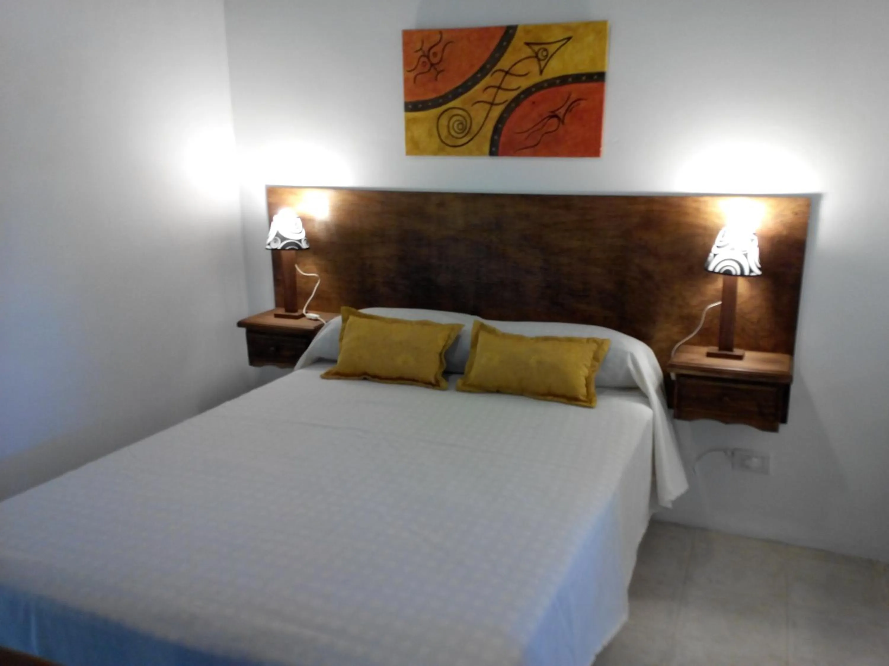 Photo of the whole room, Bed in Clima Serrano